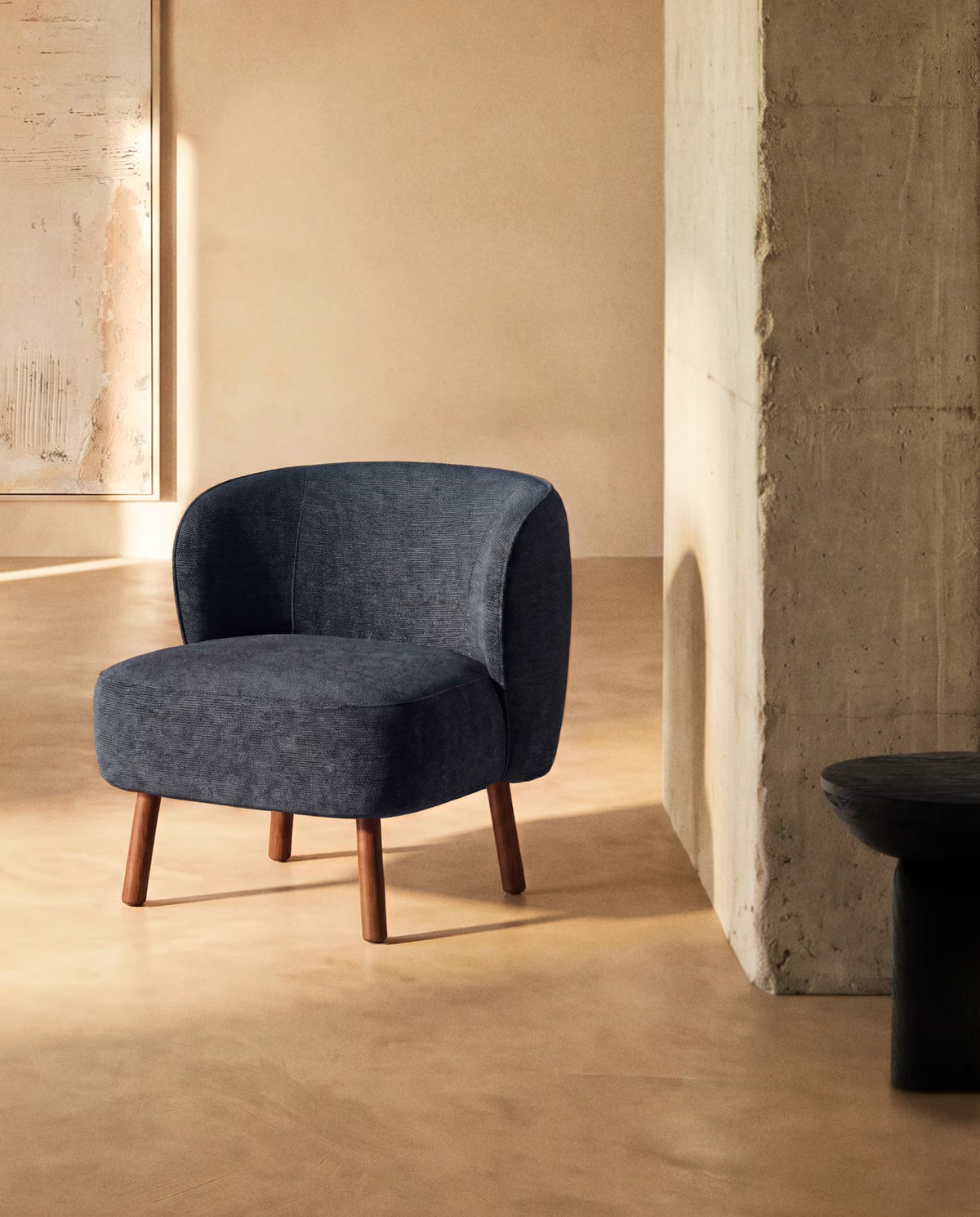 ULIT armchair in blue-gray chenille with a dark ash base.
