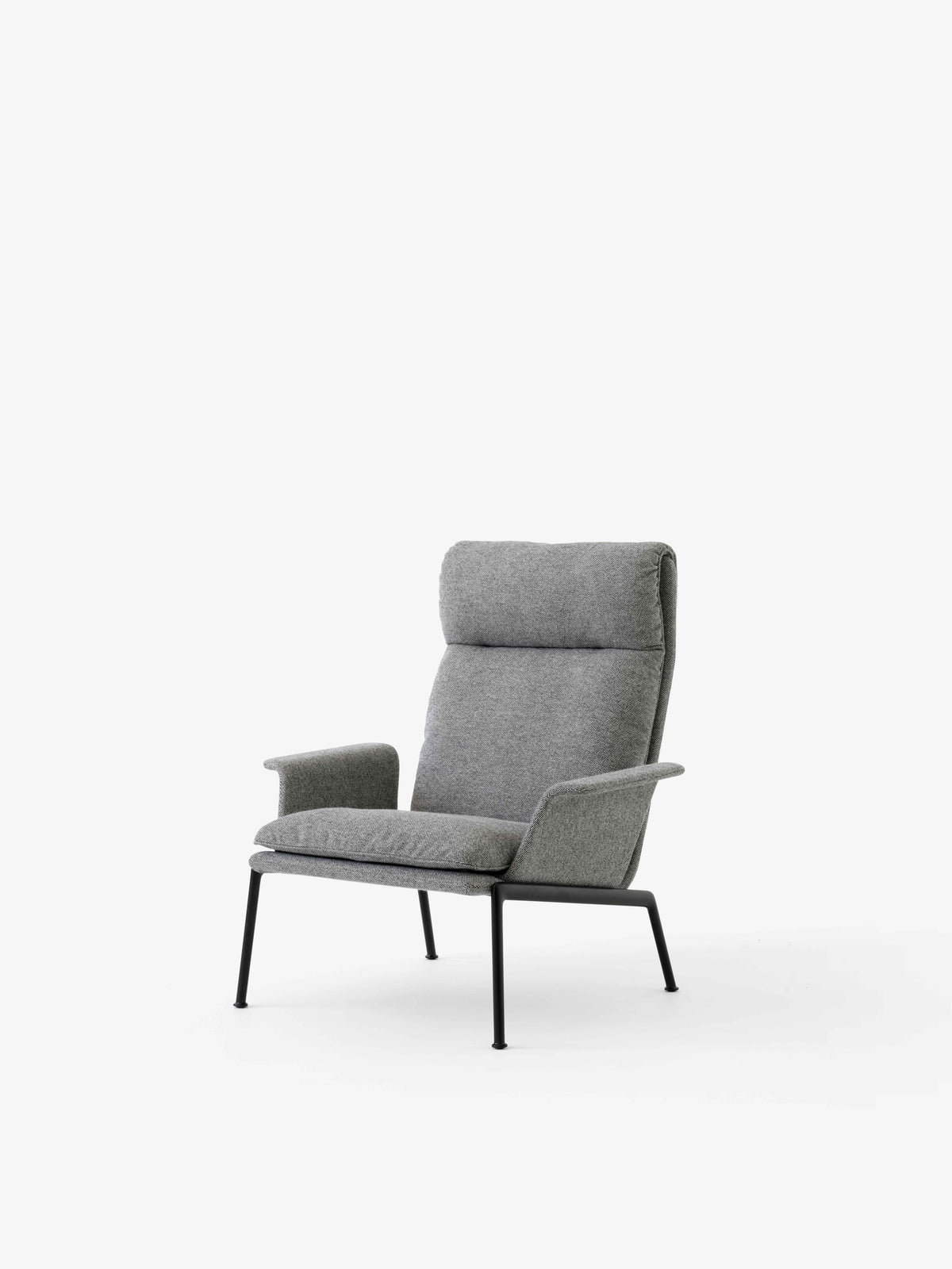 Upholstered MUNO LN17 armchair with a black base