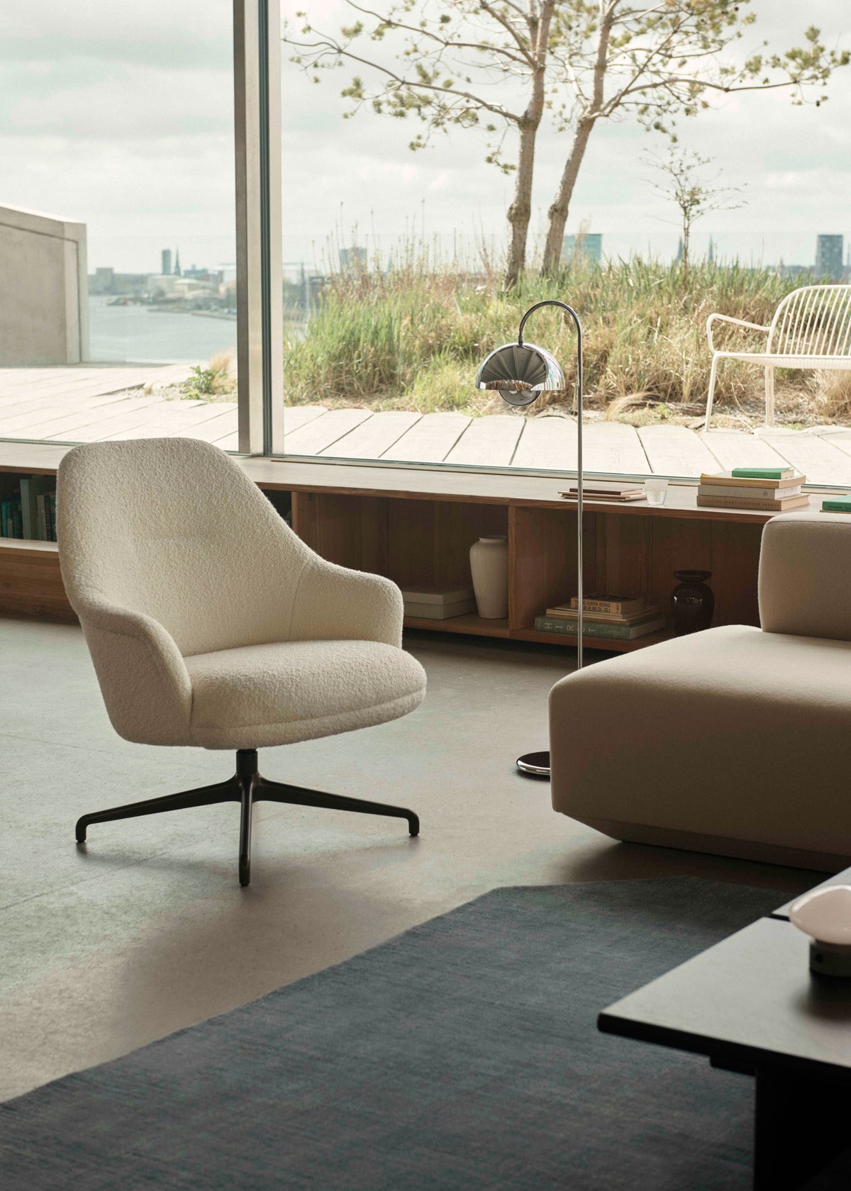 RELY HW139 swivel armchair upholstered with a bronzed base