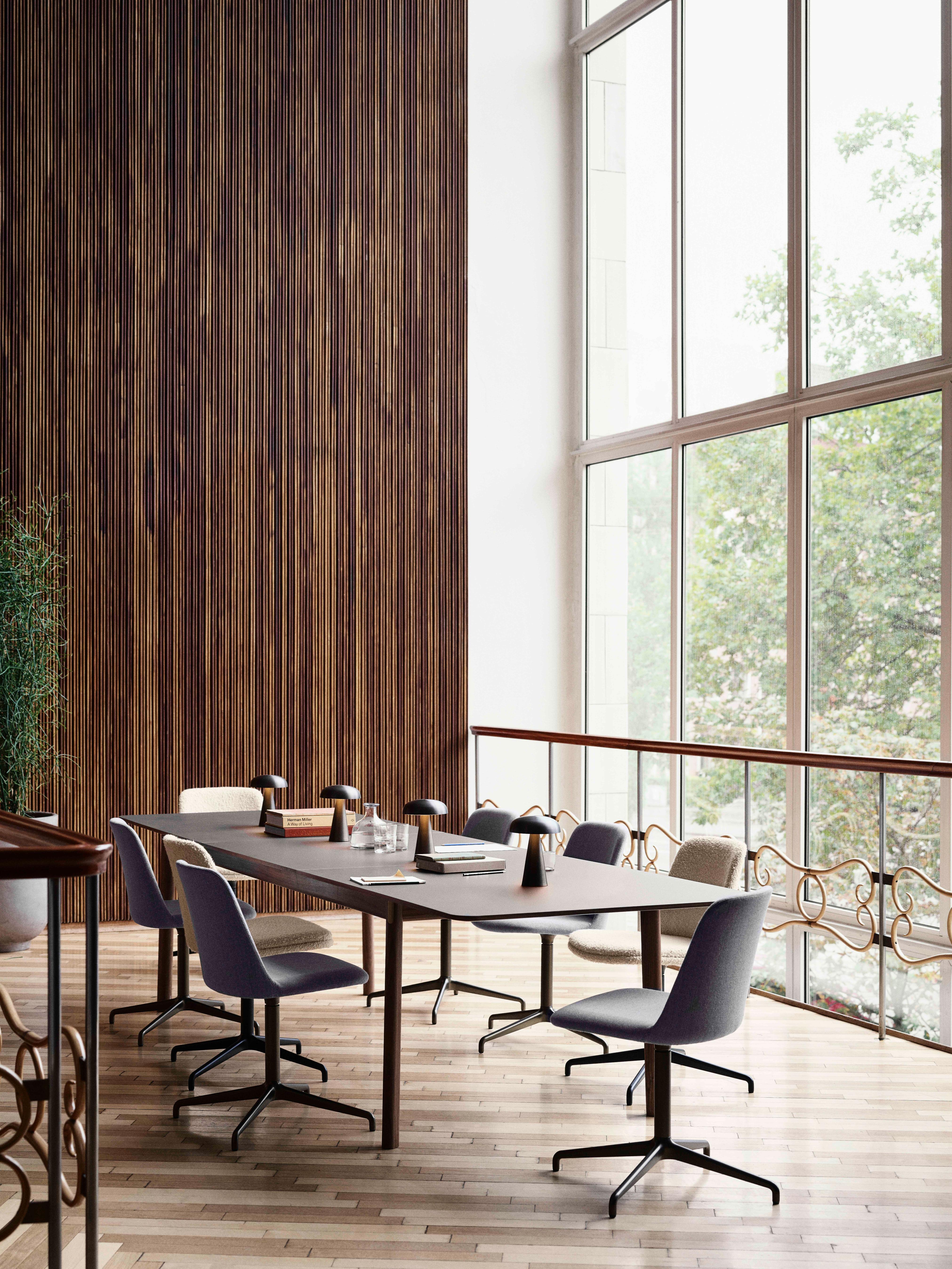 PATCH extendable table with a brown laminated top and walnut base