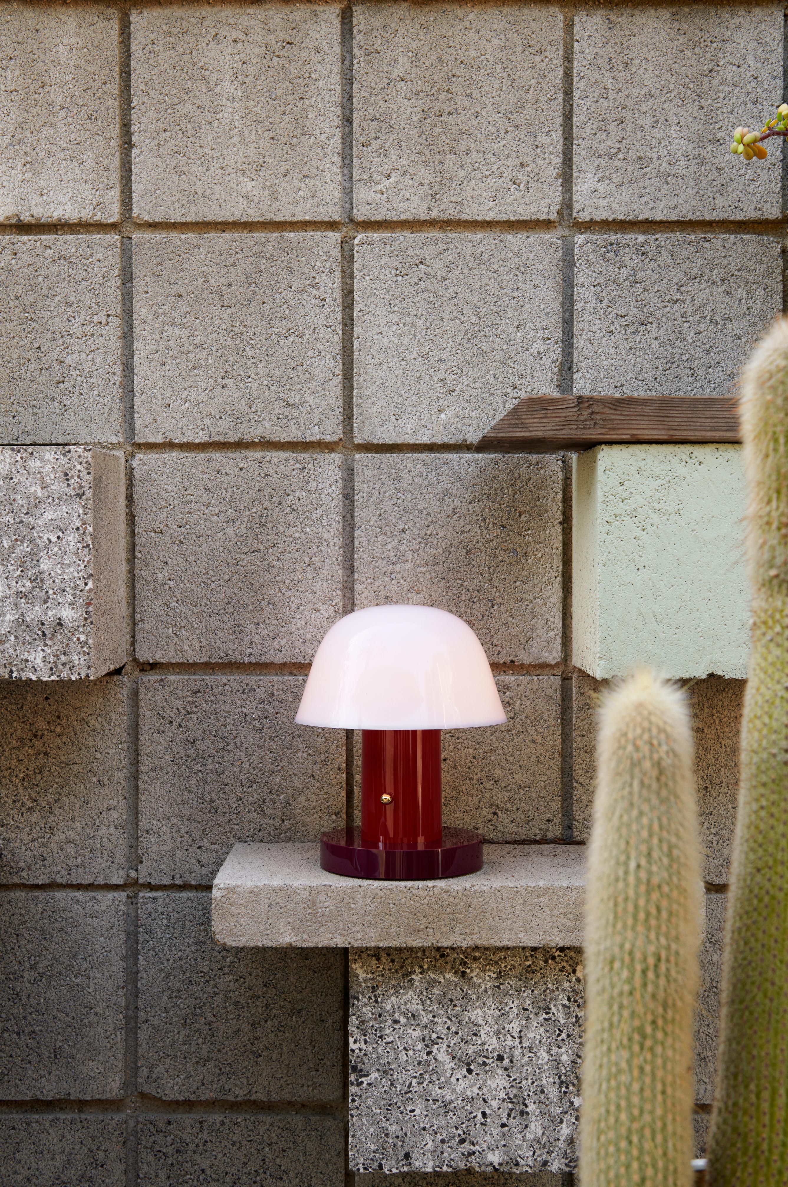 Portable lamp SETAGO JH27 with a cream shade and dark red base.