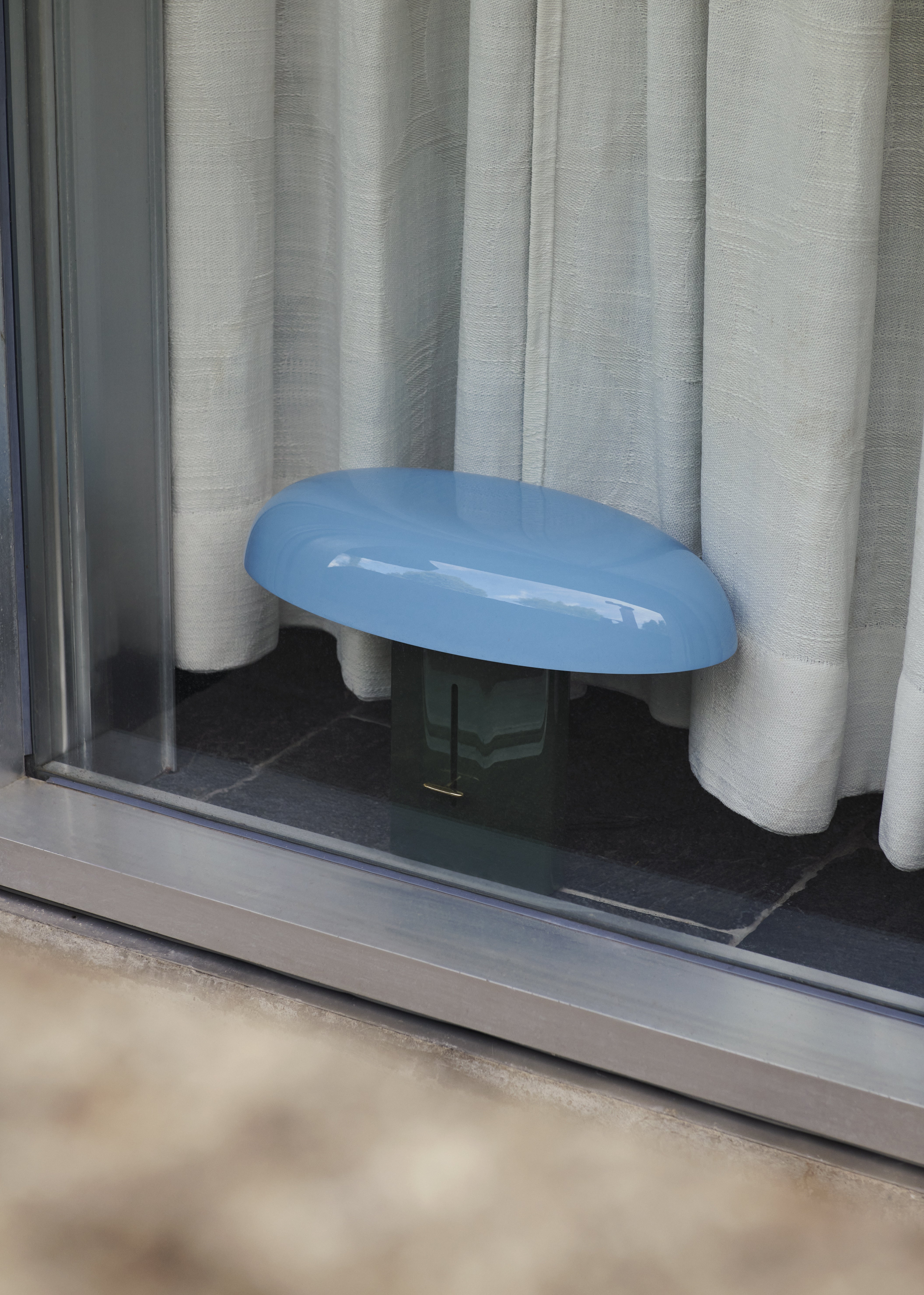 MONTERA JH42 table lamp with a light blue shade and a dark green base.