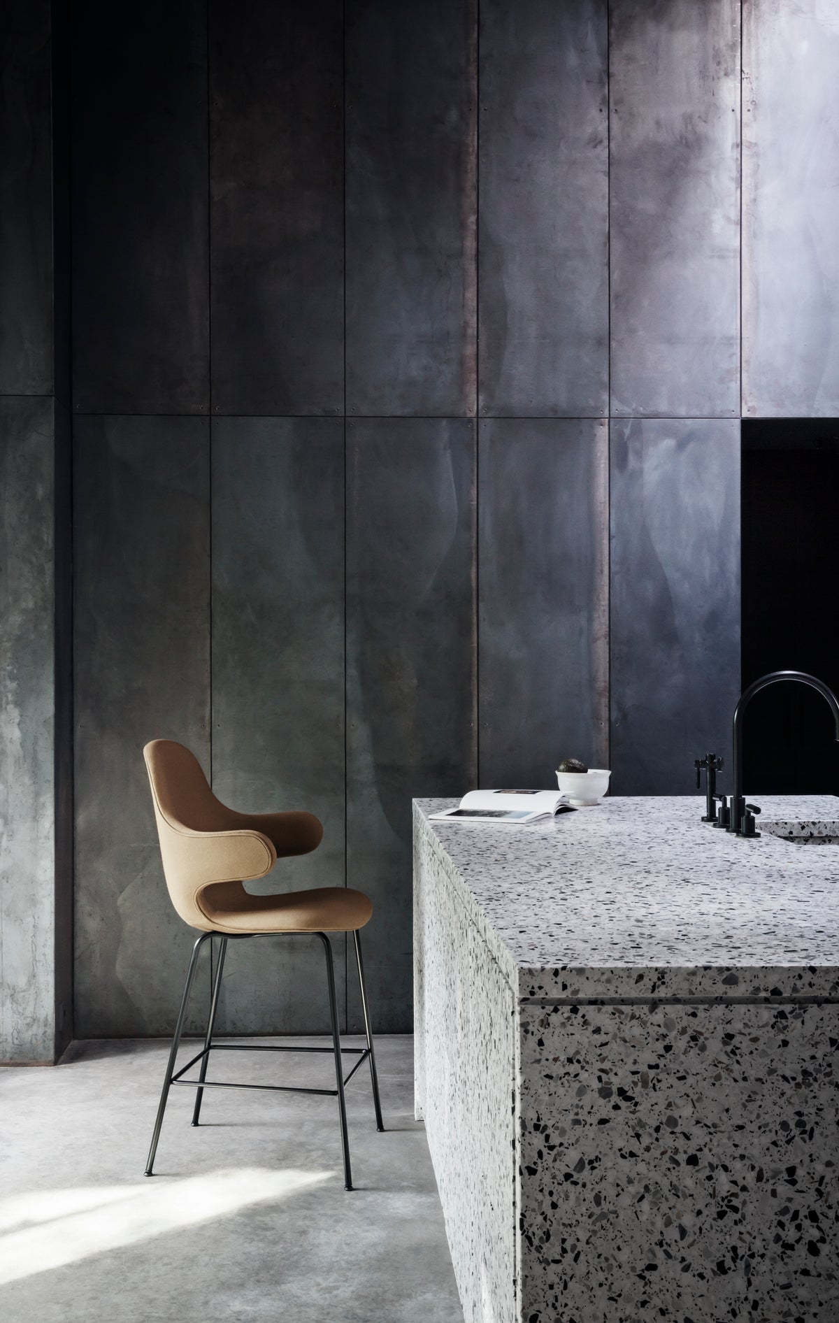 CATCH upholstered stool with a black base