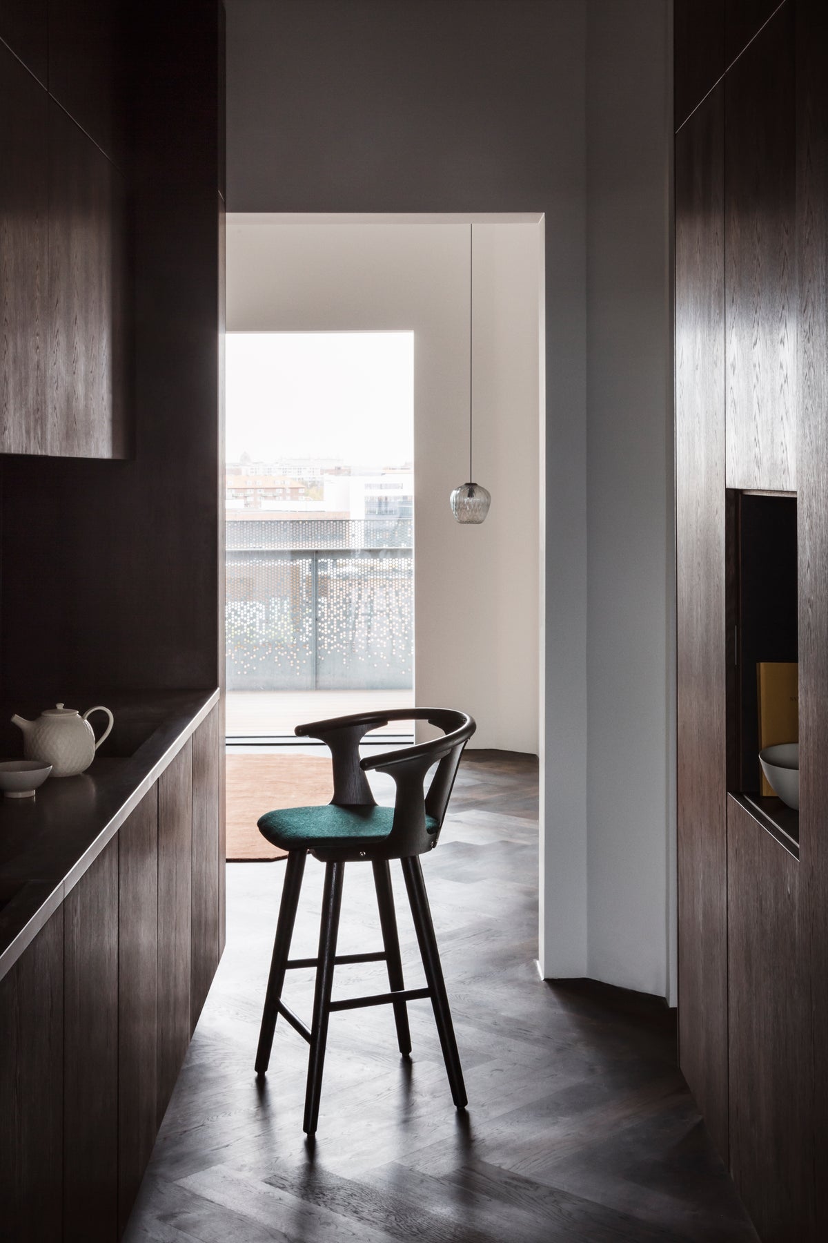 IN BETWEEN stool in black lacquered oak with upholstered seat