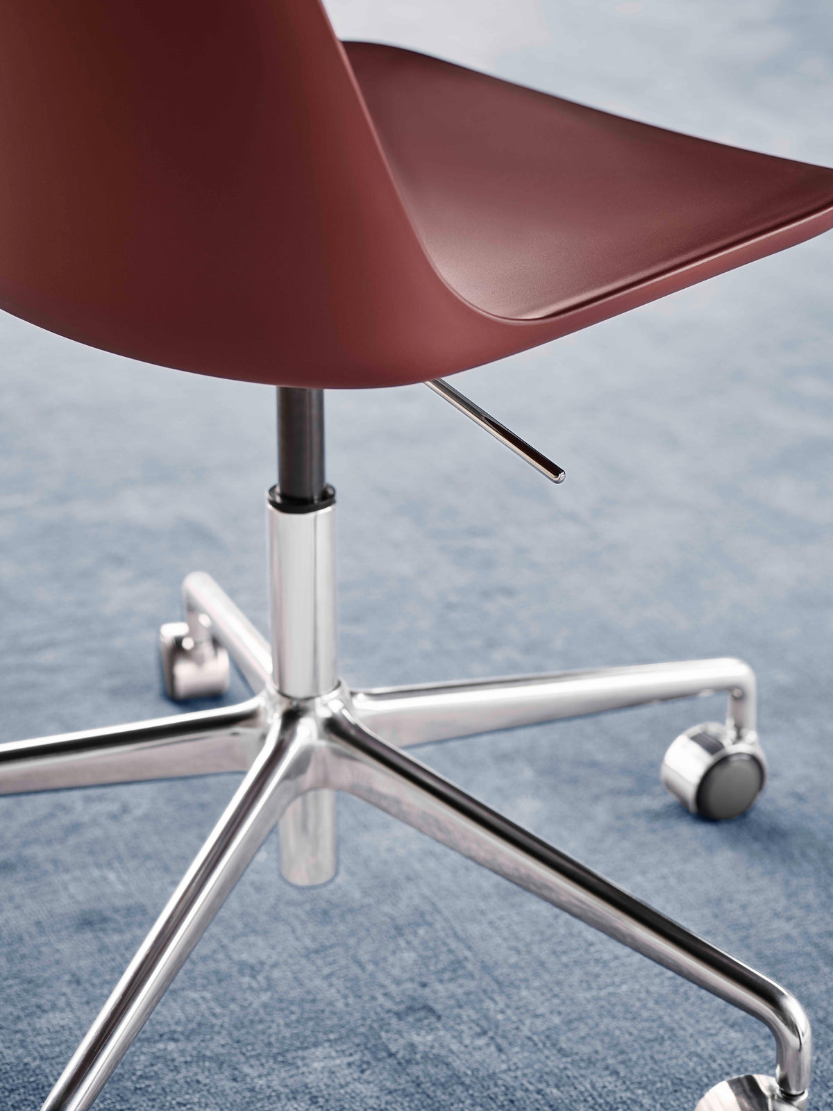 RELY HW28 office chair in light pink with an aluminum base on wheels