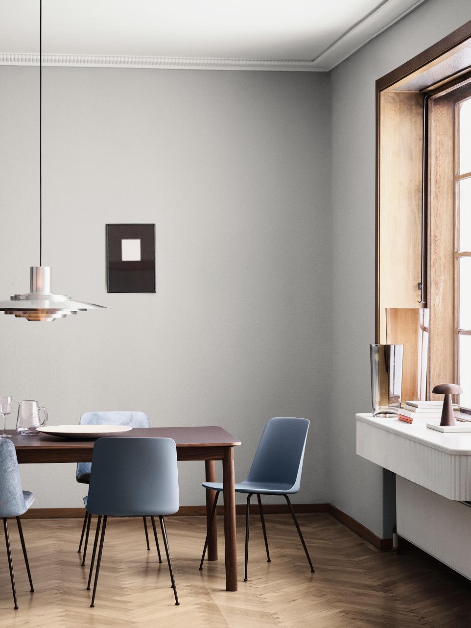 PATCH extendable table with a brown laminated top and walnut base