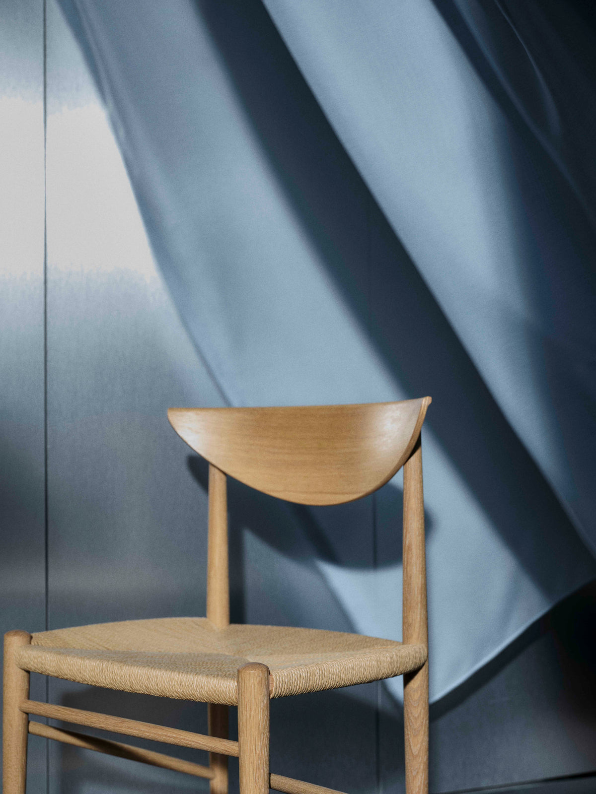 DRAWN HM3 chair in oiled oak with a woven seat