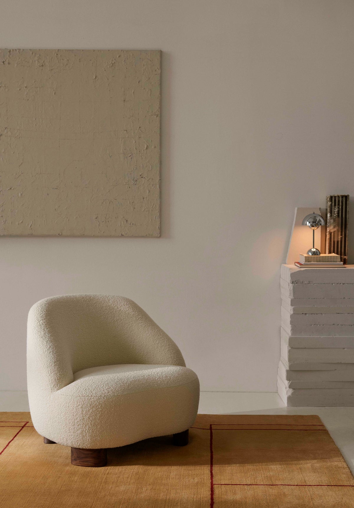 MARGAS LC1 upholstered armchair with a walnut base