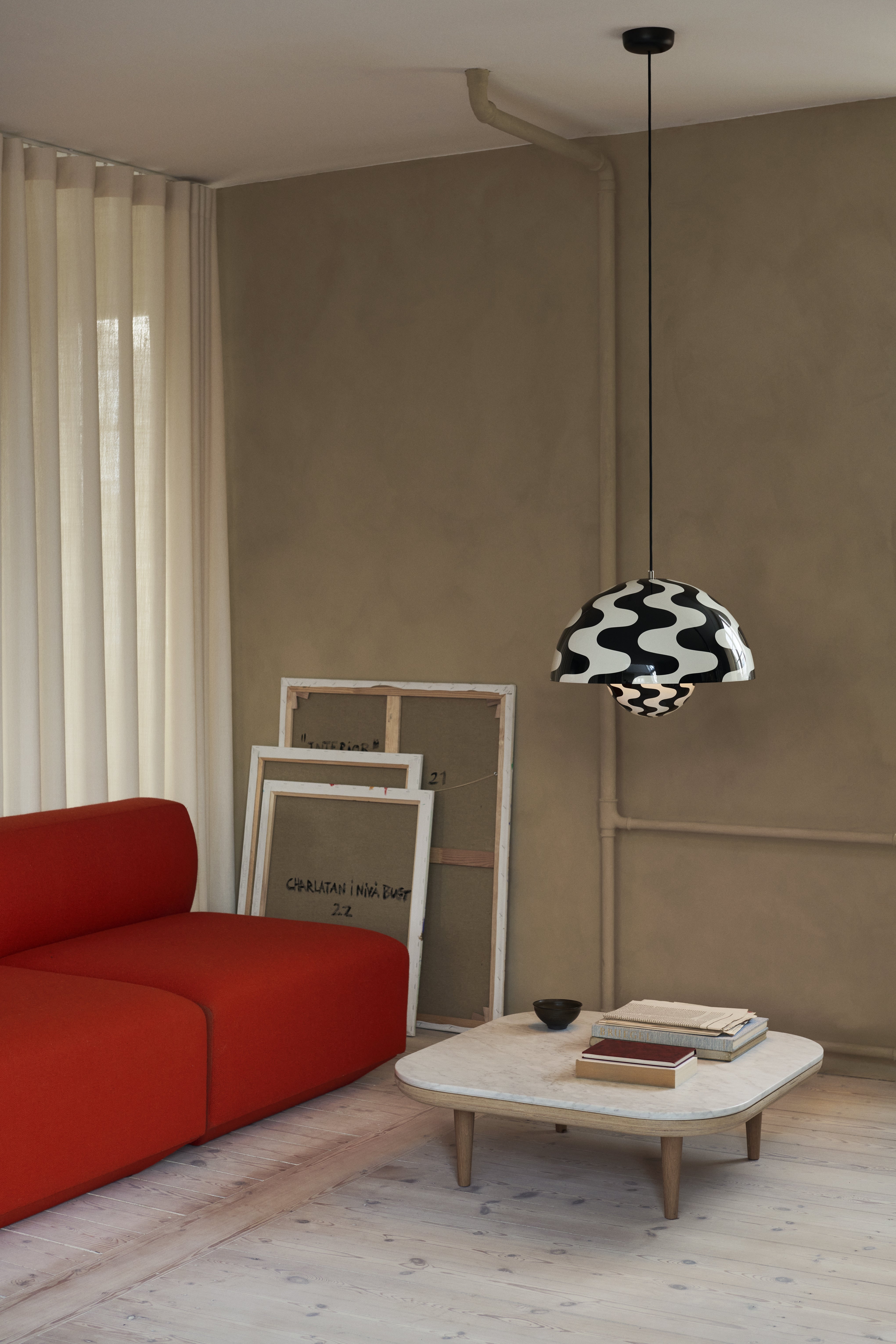 FLOWERPOT VP2 pendant lamp in a black and white pattern.