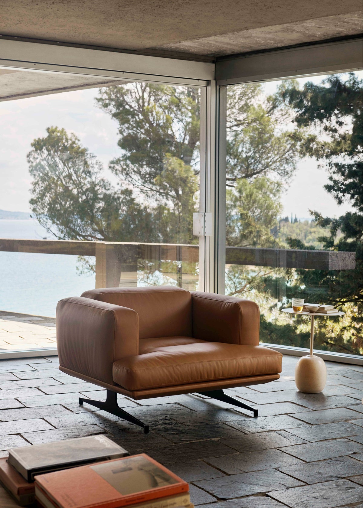 INLAND AV21 upholstered armchair with a black base