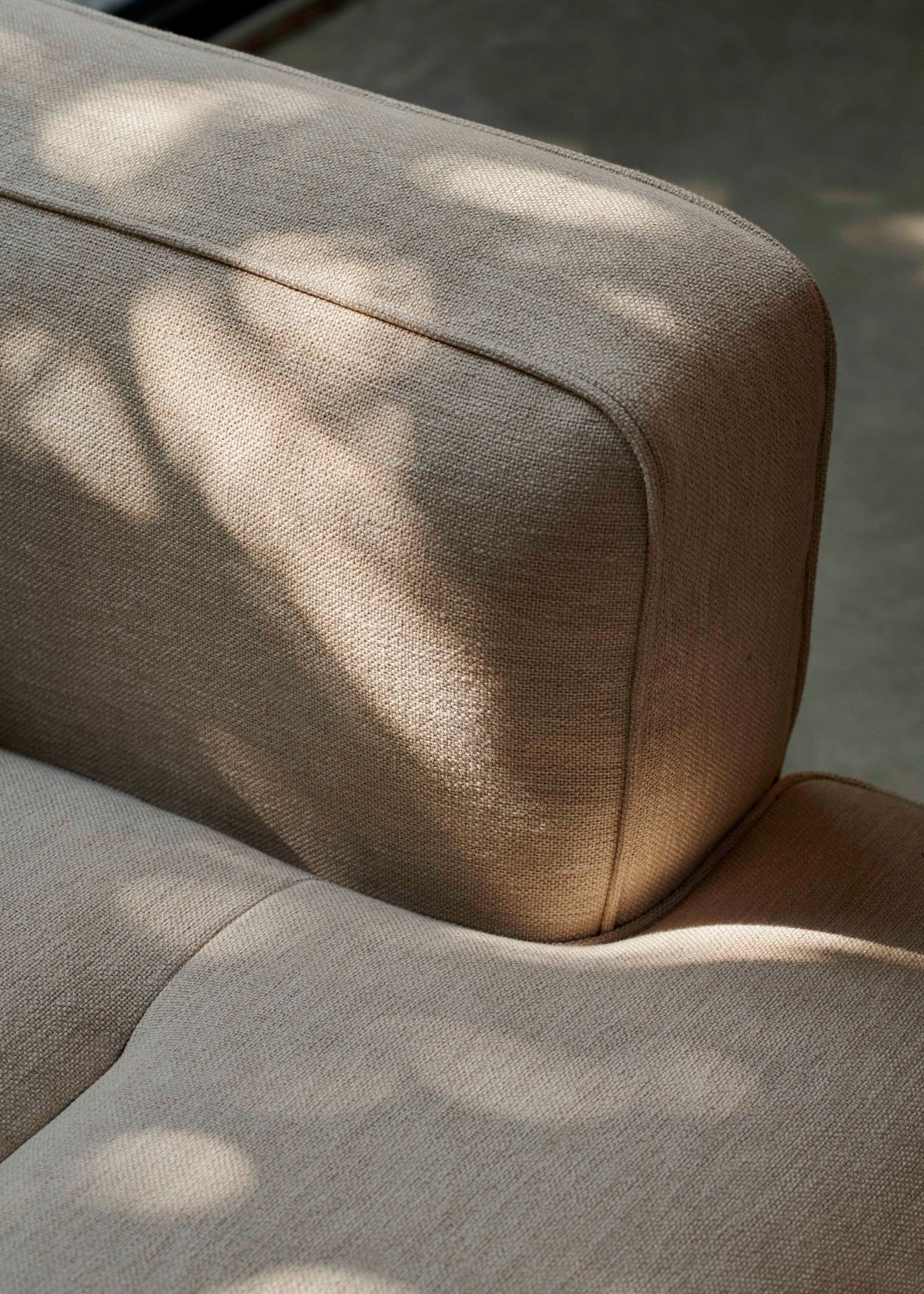 INLAND AV21 upholstered armchair with a black base