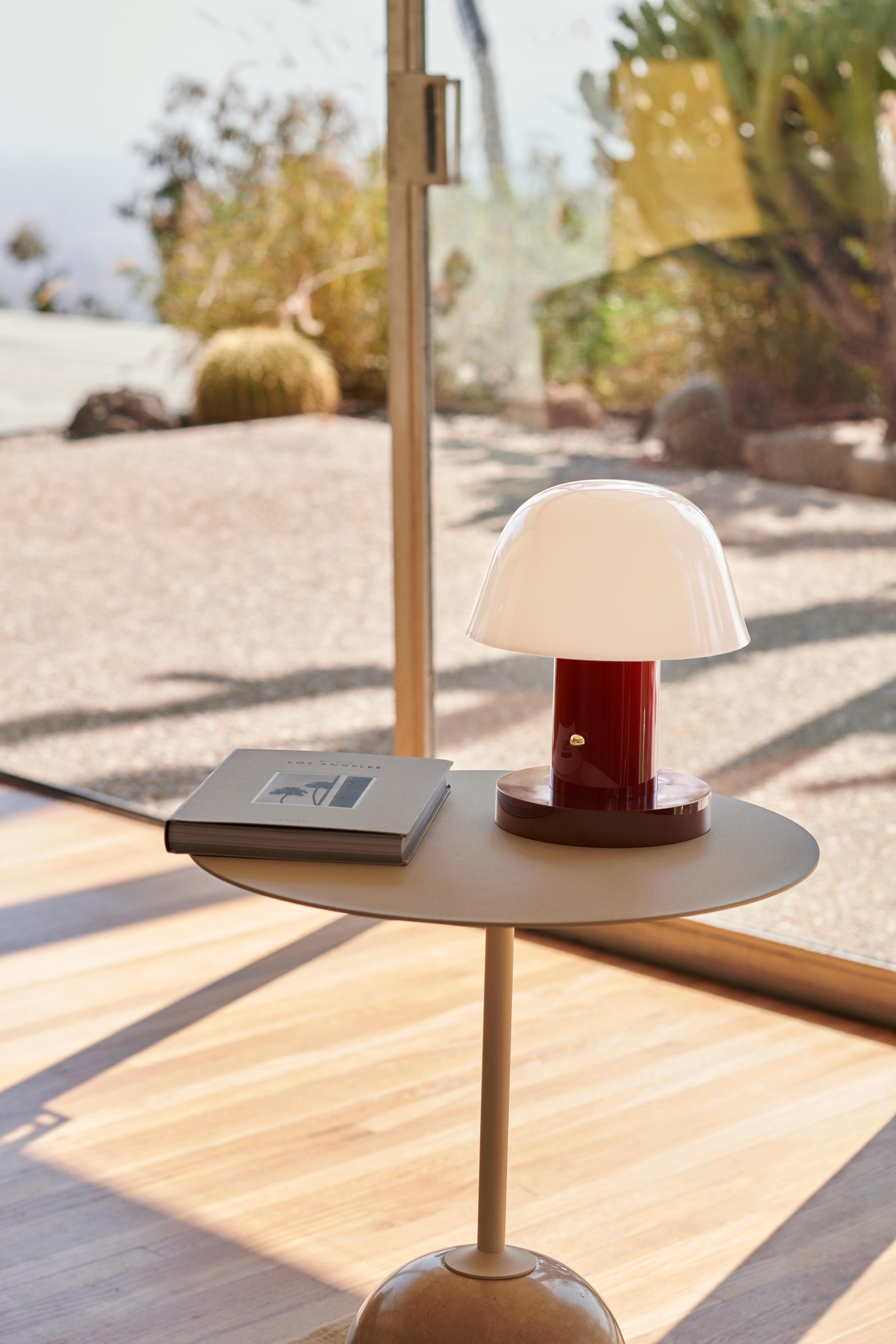Portable lamp SETAGO JH27 with a cream shade and dark red base.