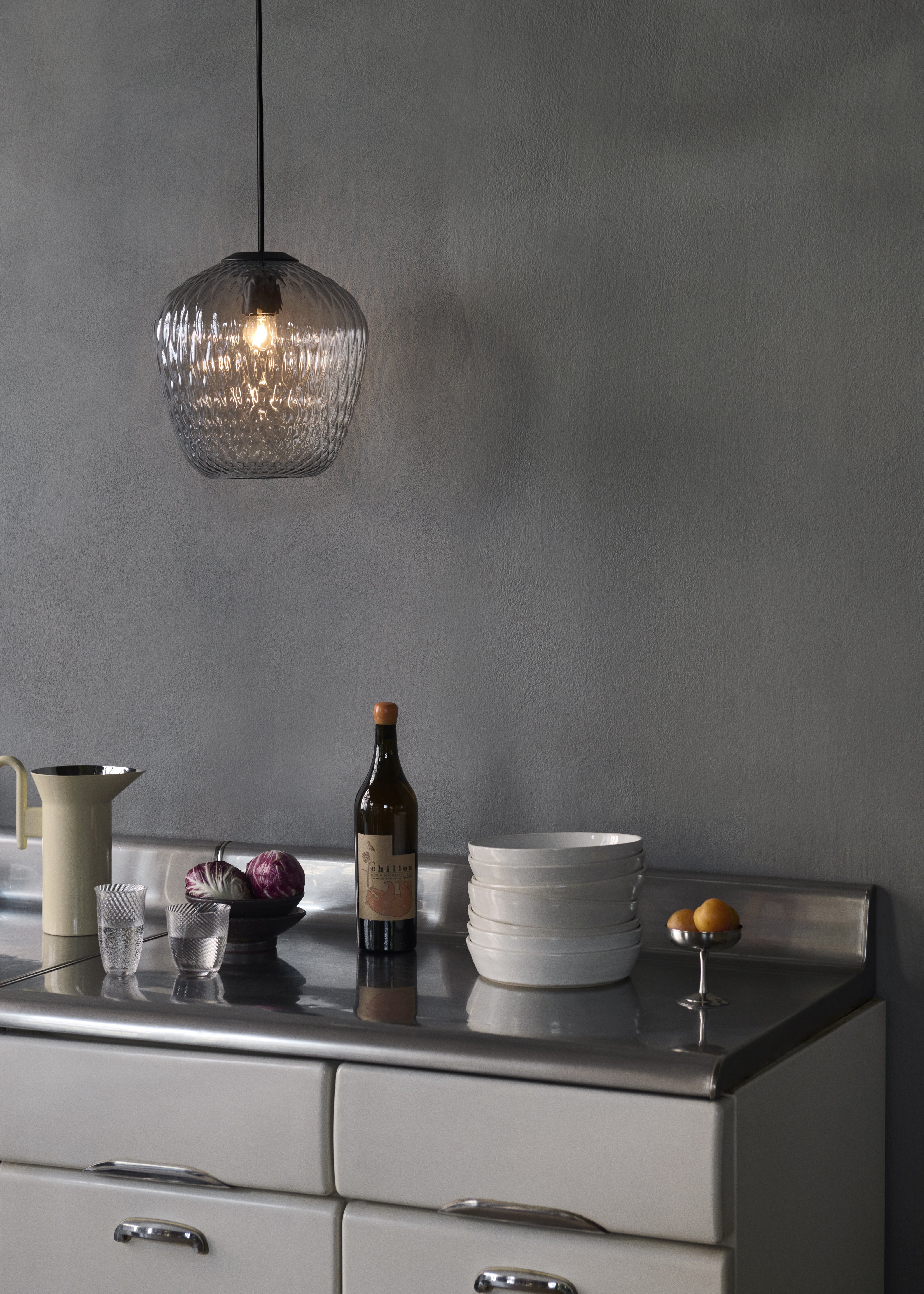 Blown pendant lamp with a glossy shade