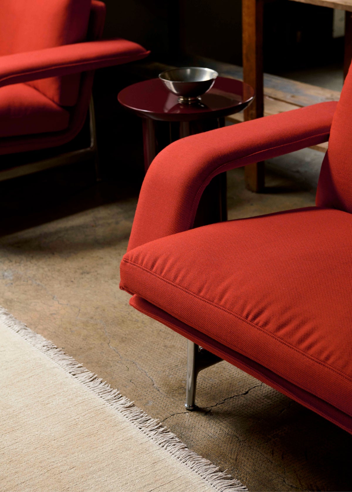 MEANTIME AV29 upholstered armchair with a black base