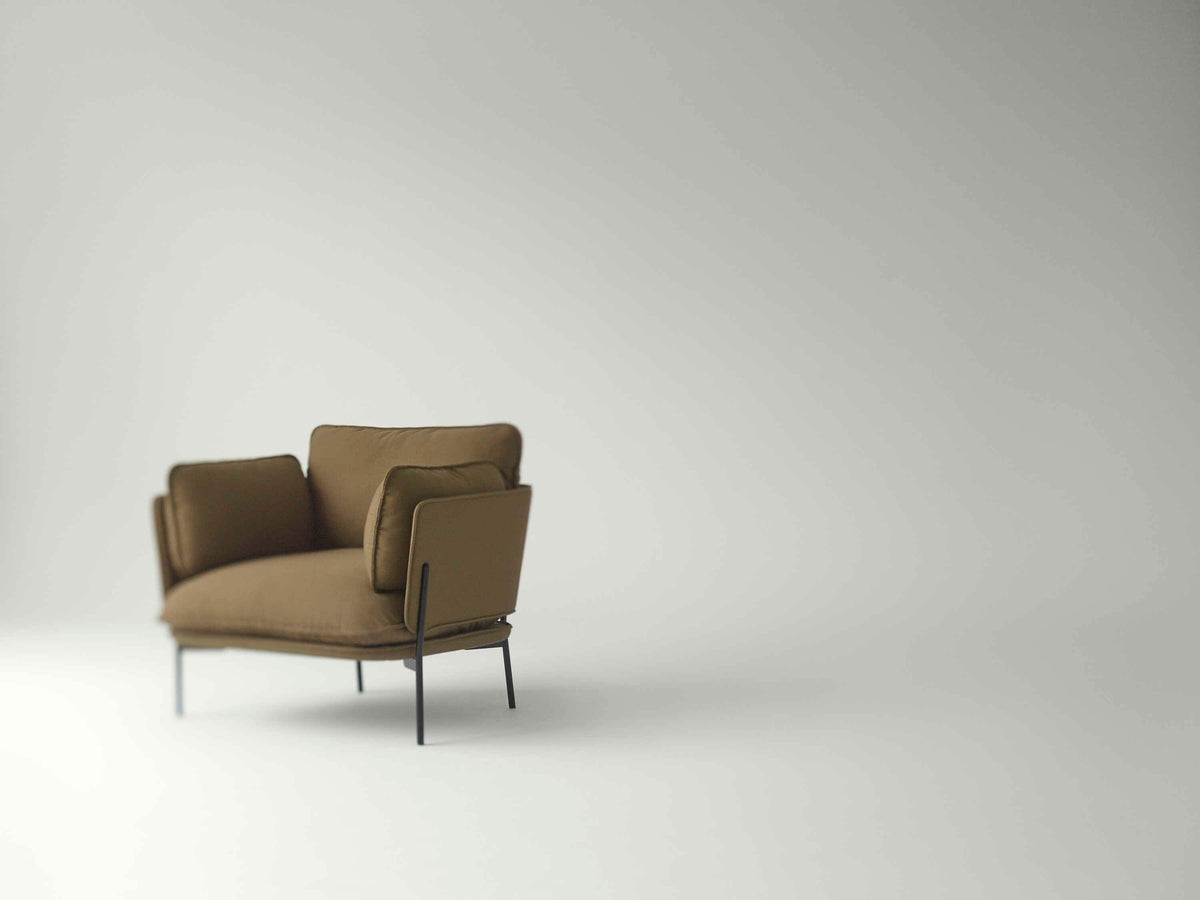 Armchair CLOUD LN1 upholstered with a black base