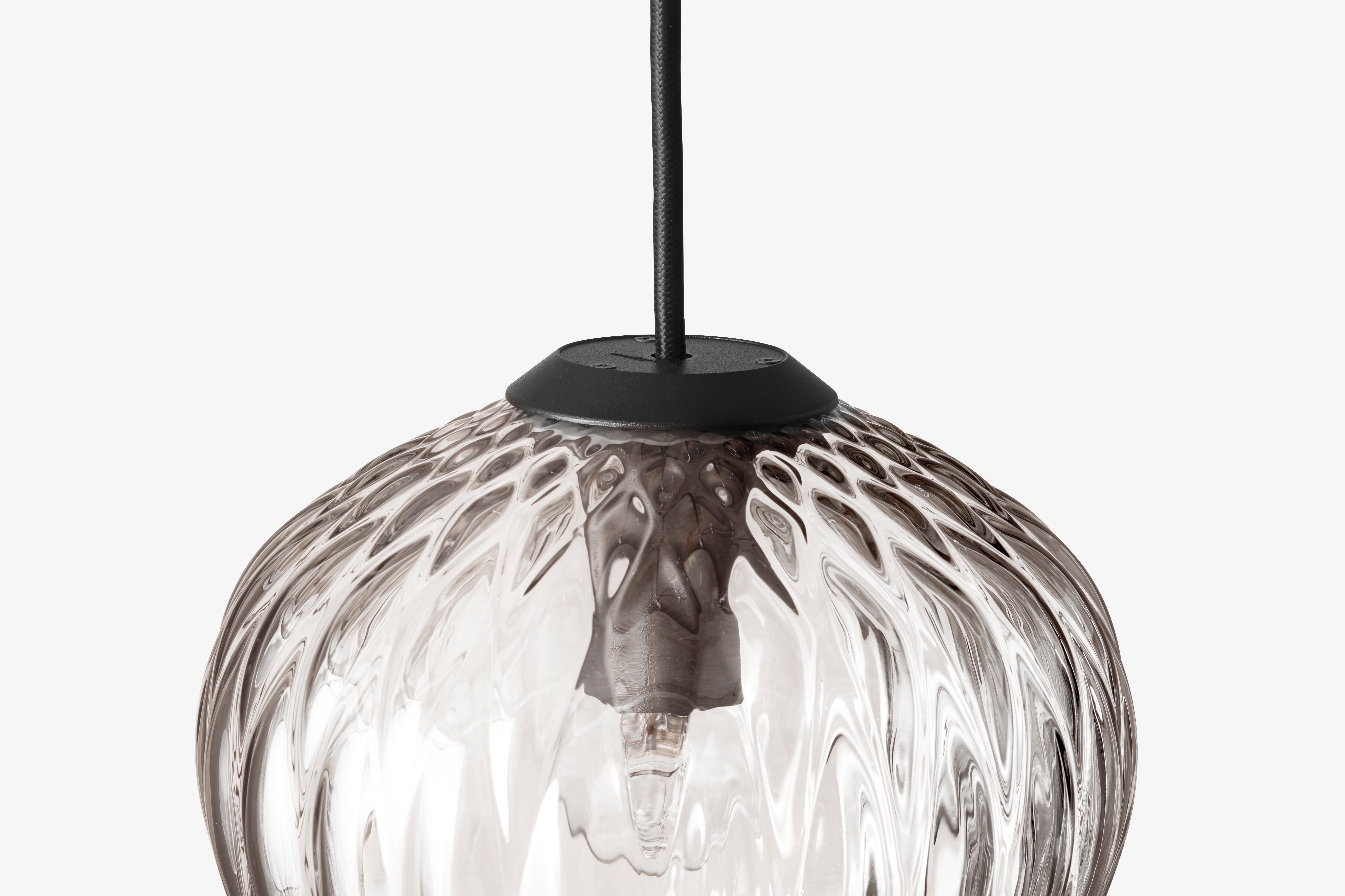 Blown pendant lamp with a glossy shade
