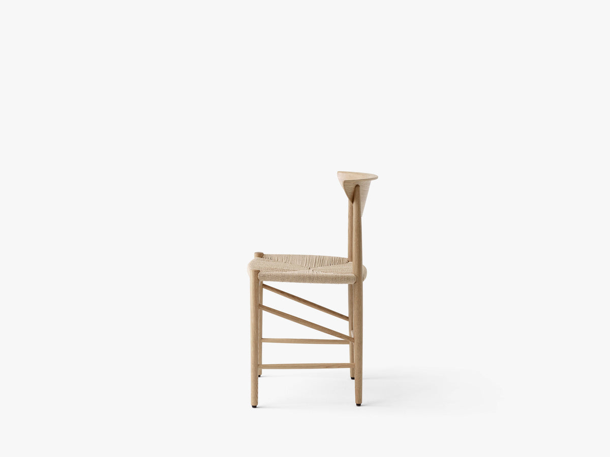 DRAWN HM3 chair in oiled oak with a woven seat