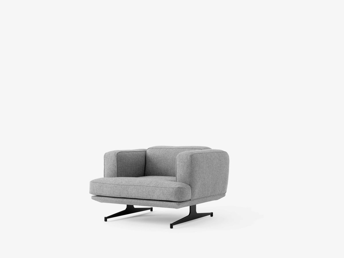 INLAND AV21 upholstered armchair with a black base