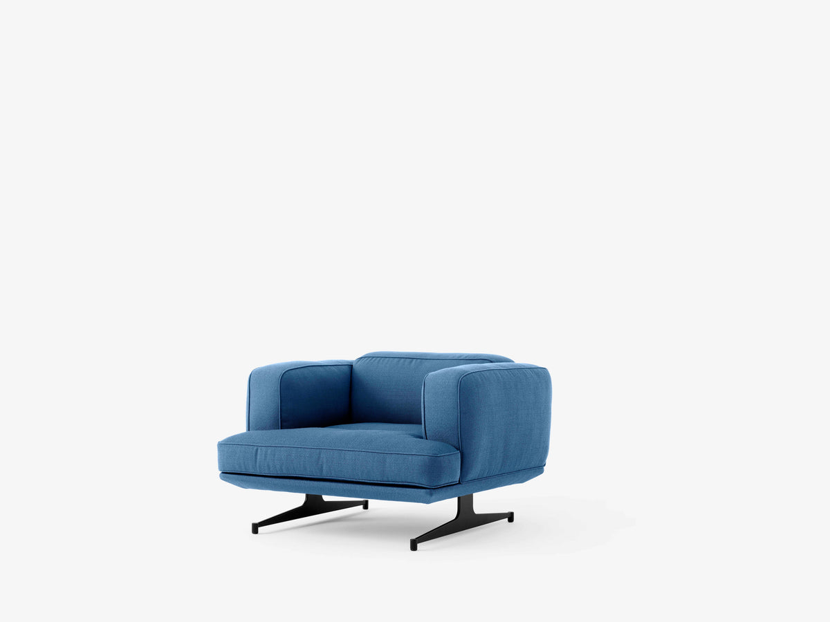 INLAND AV21 upholstered armchair with a black base