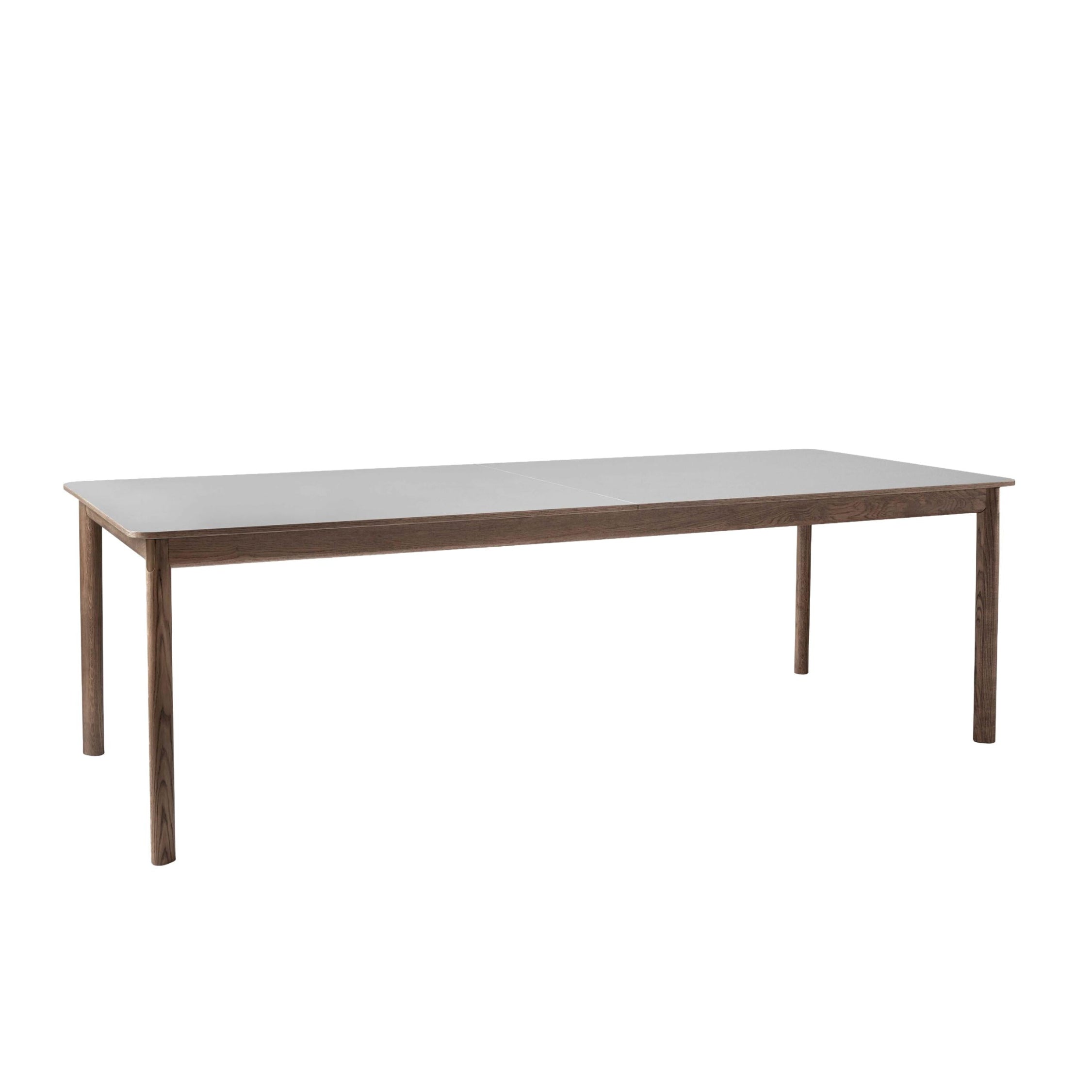 PATCH gray extendable table with a laminated top and a smoked oak base