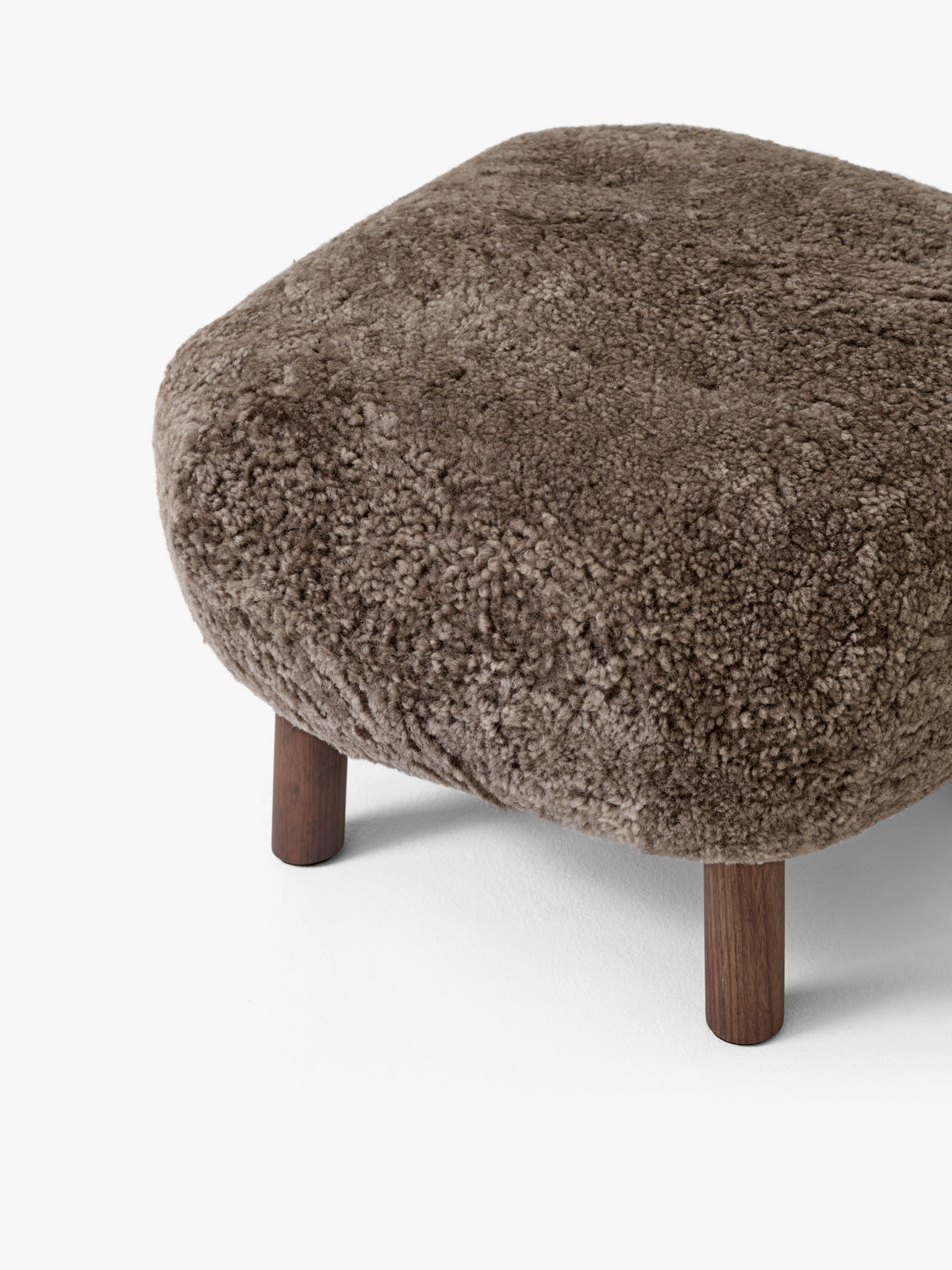 Upholstered footrest ATD1 with a walnut base