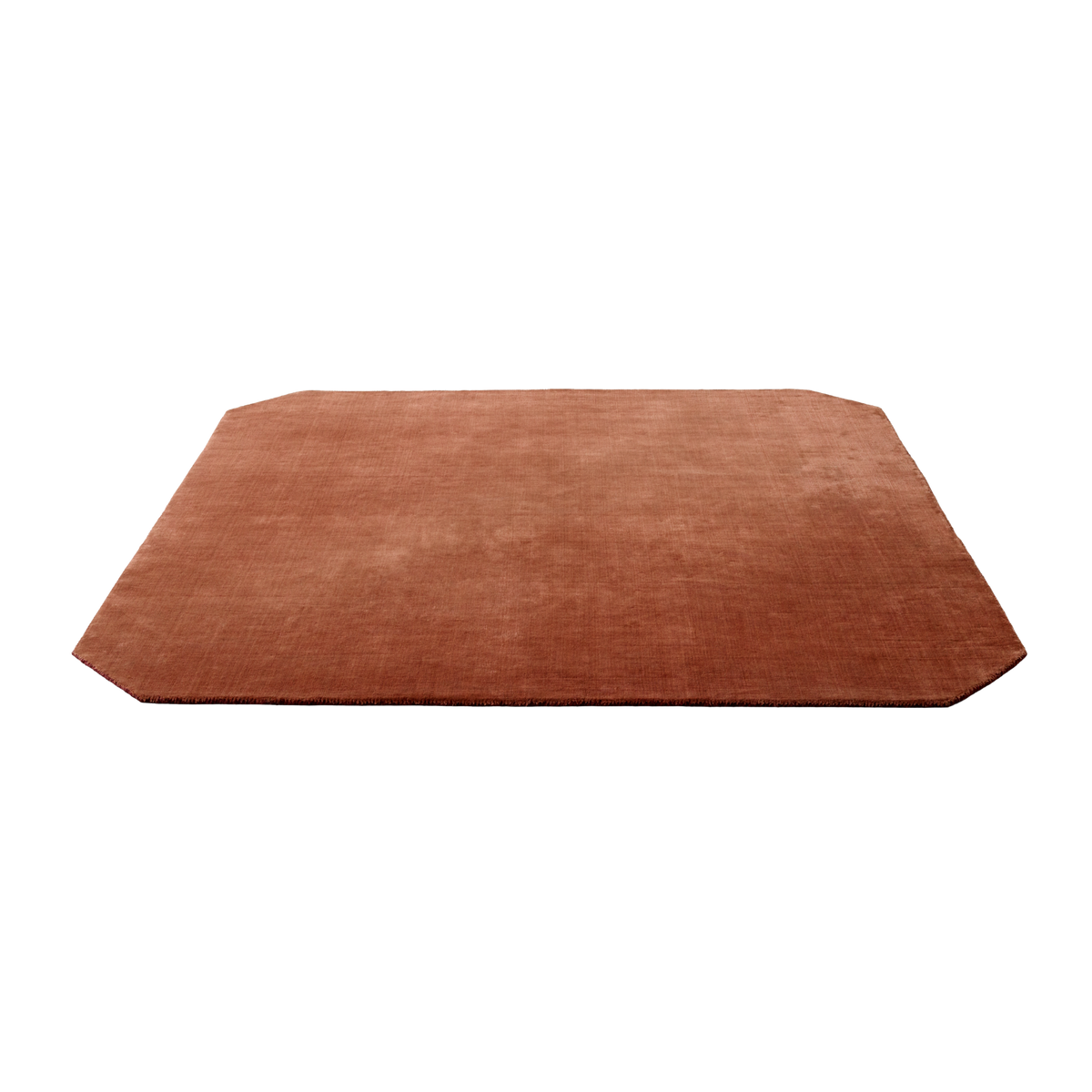 THE MOOR square rug with rounded corners in muted red