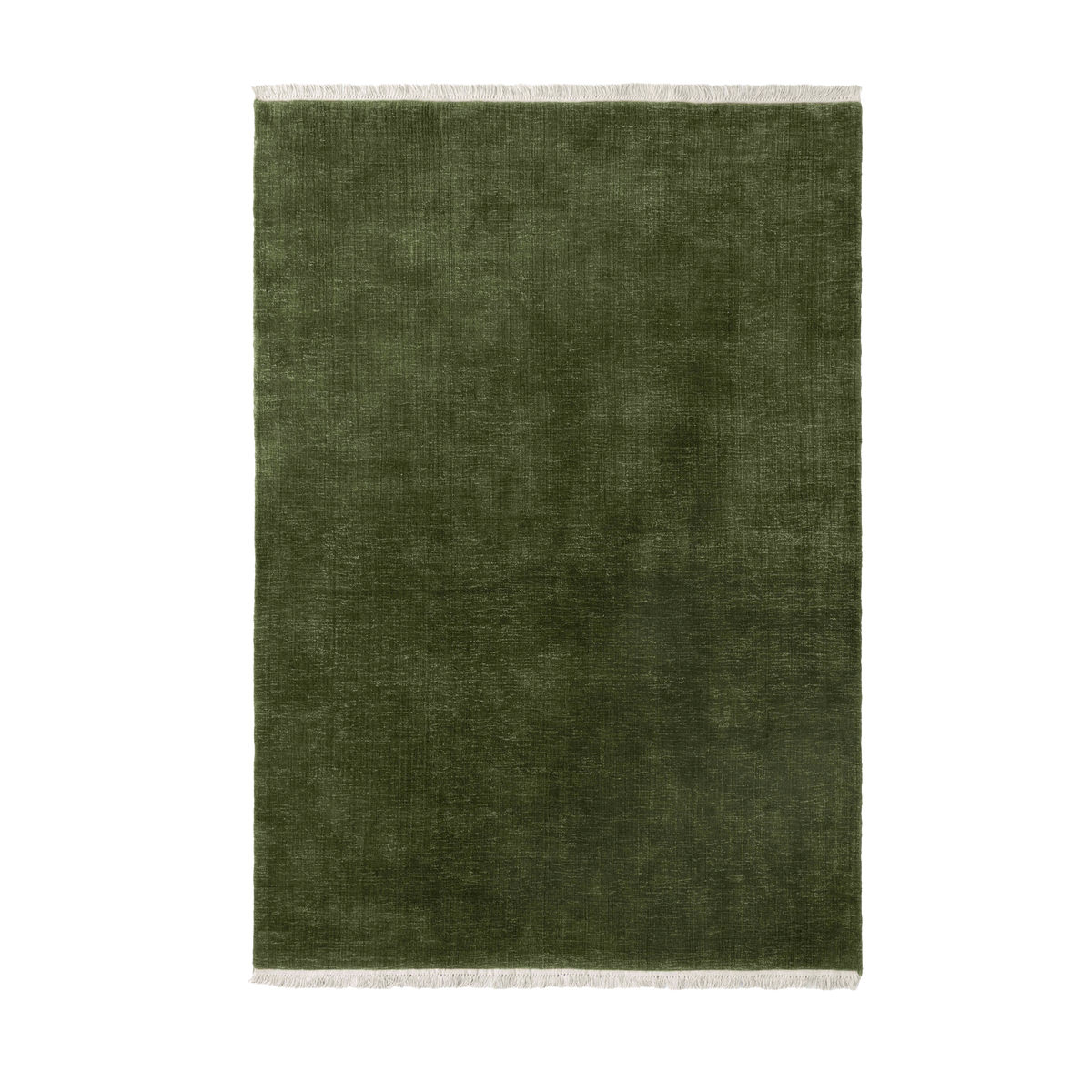 THE MOOR fringed rug in dark green