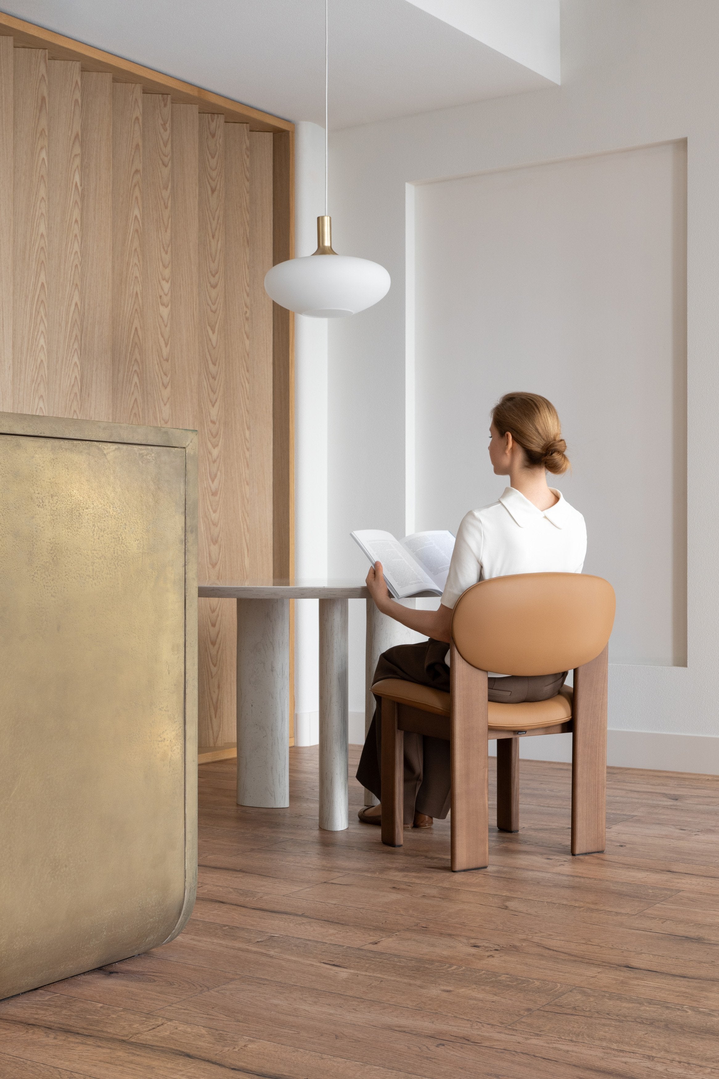 ARCHIPEN upholstered chair with a brown ash base
