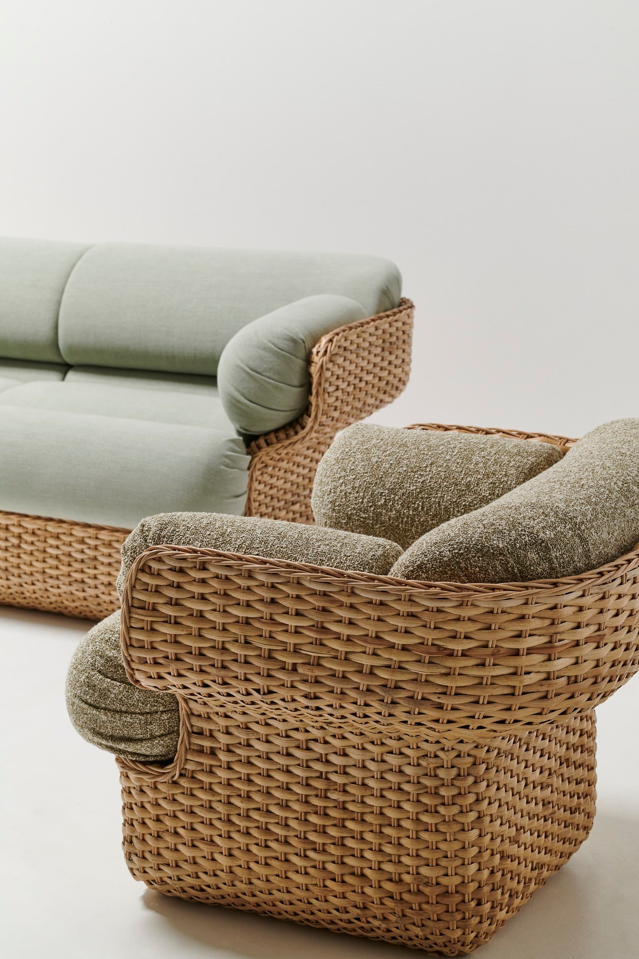 BASKET armchair in green with rattan