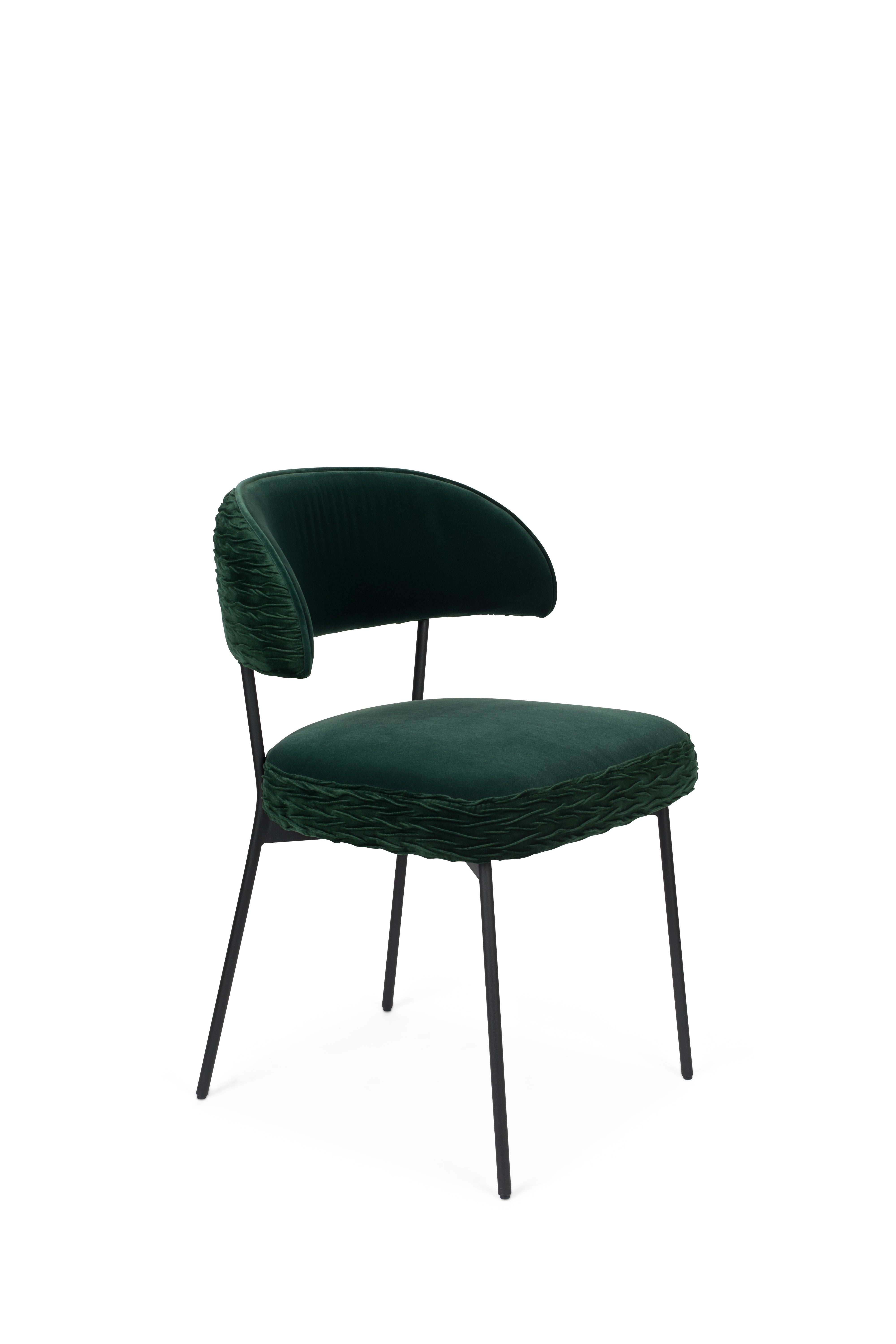THE WINNER TAKES IT ALL chair dark green with a black base