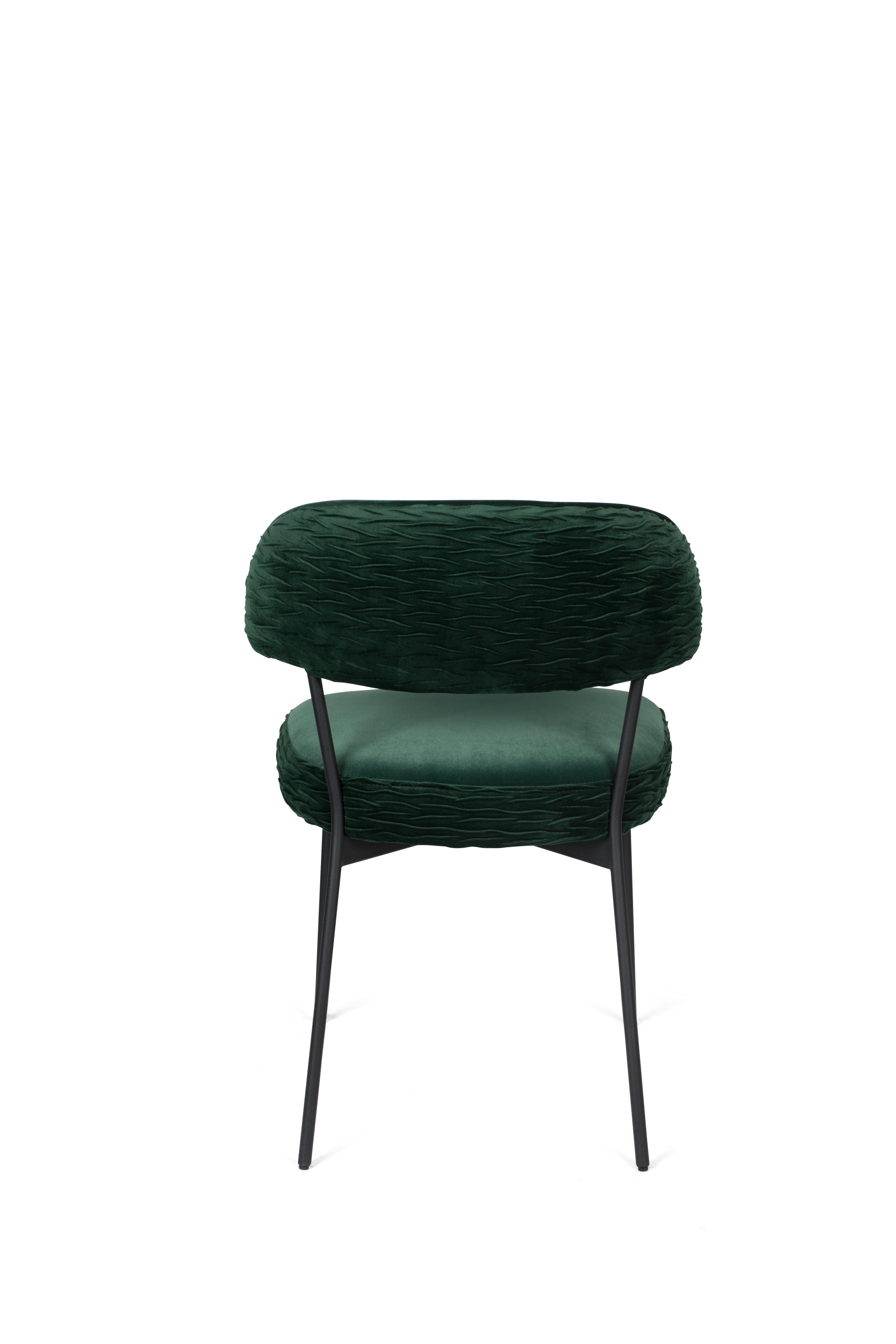 THE WINNER TAKES IT ALL chair dark green with a black base