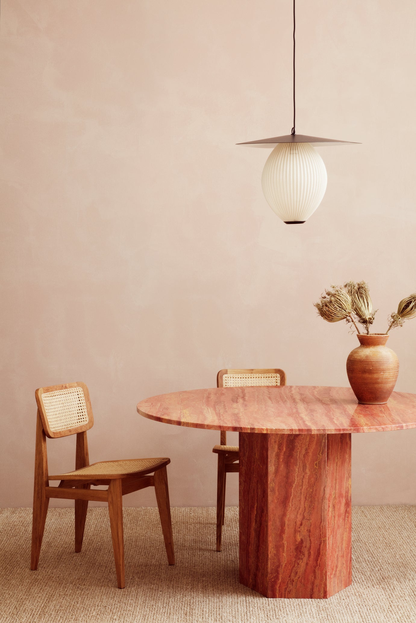 EPIC round table red travertine