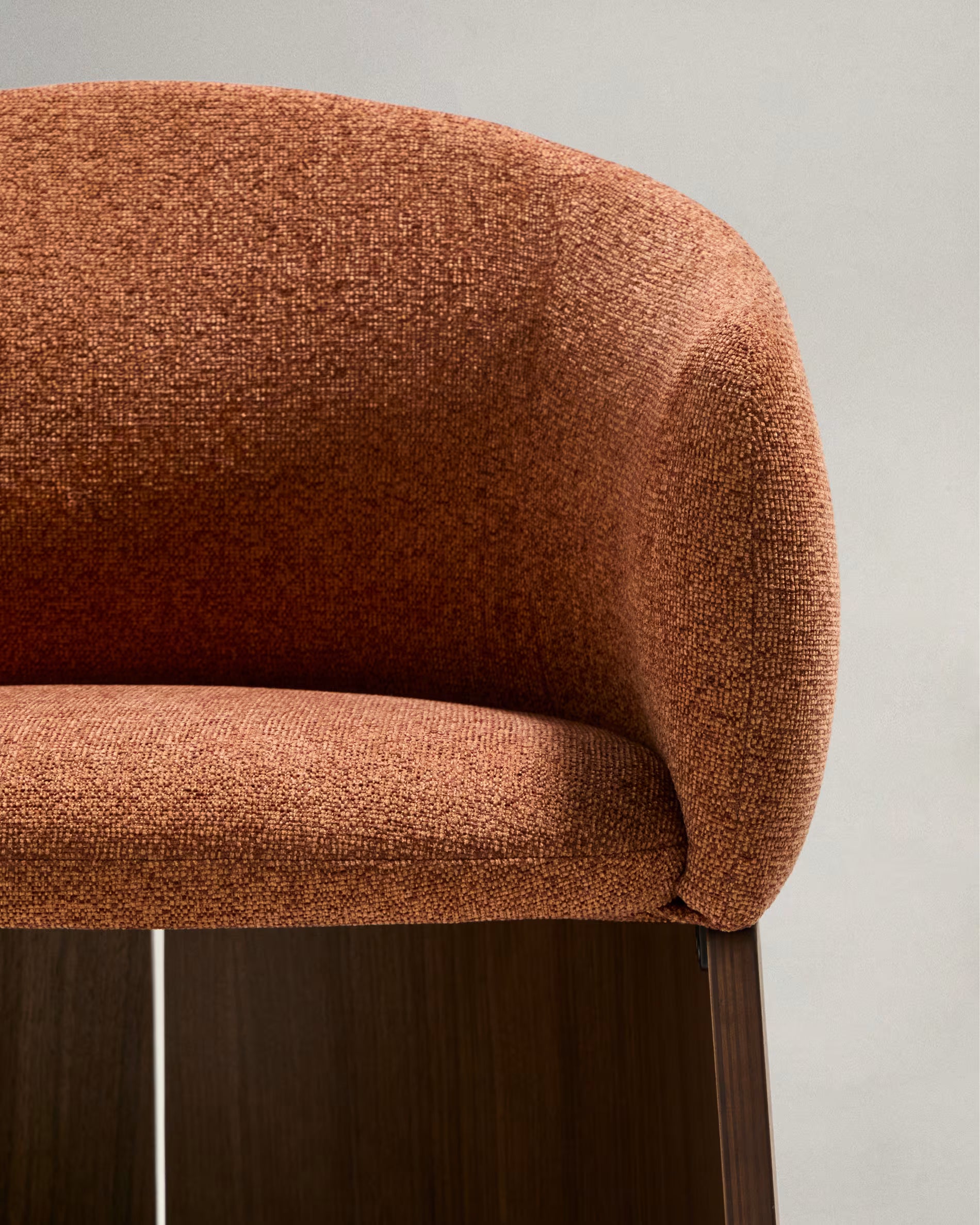 BOSCA chair in brick-colored chenille with a walnut veneer base