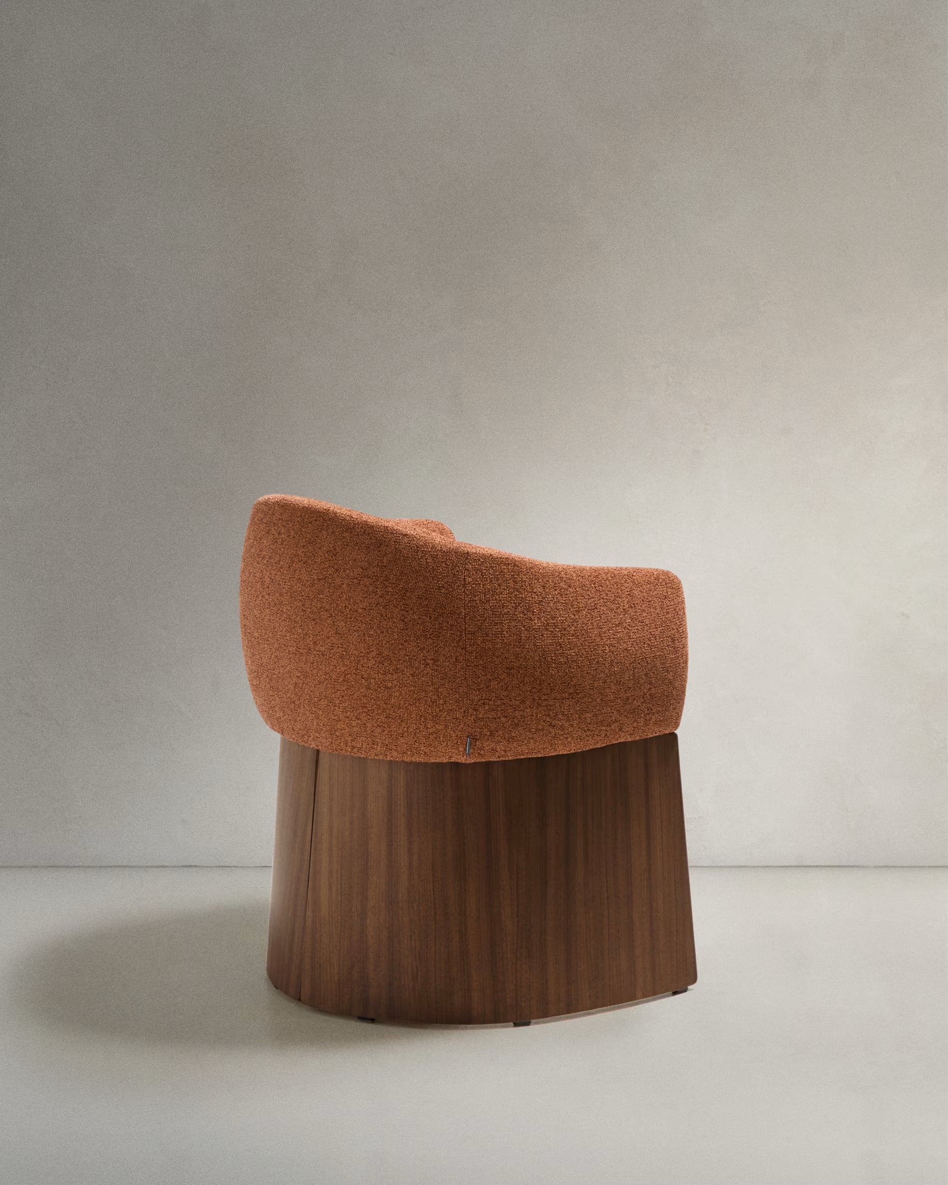 BOSCA chair in brick-colored chenille with a walnut veneer base