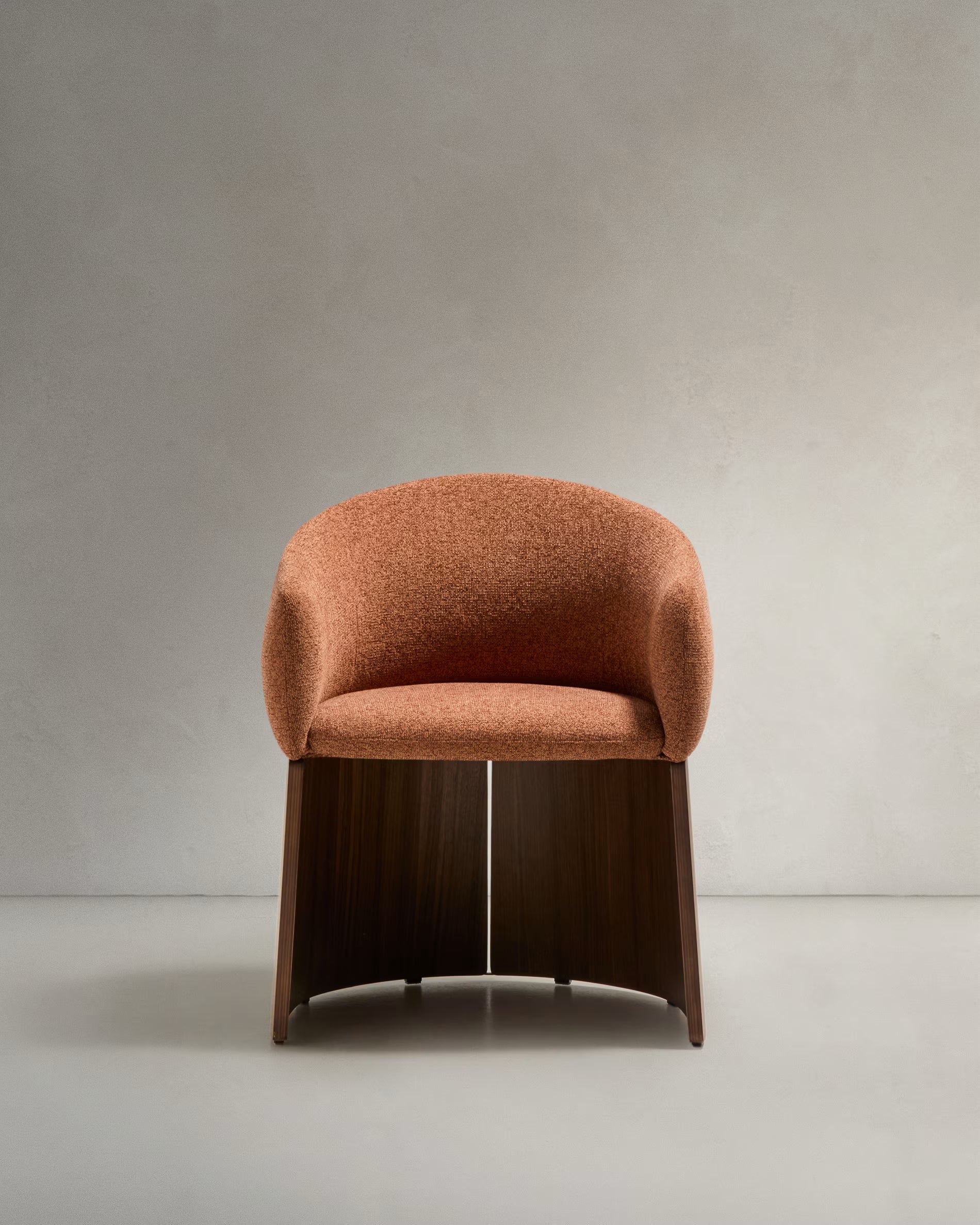 BOSCA chair in brick-colored chenille with a walnut veneer base