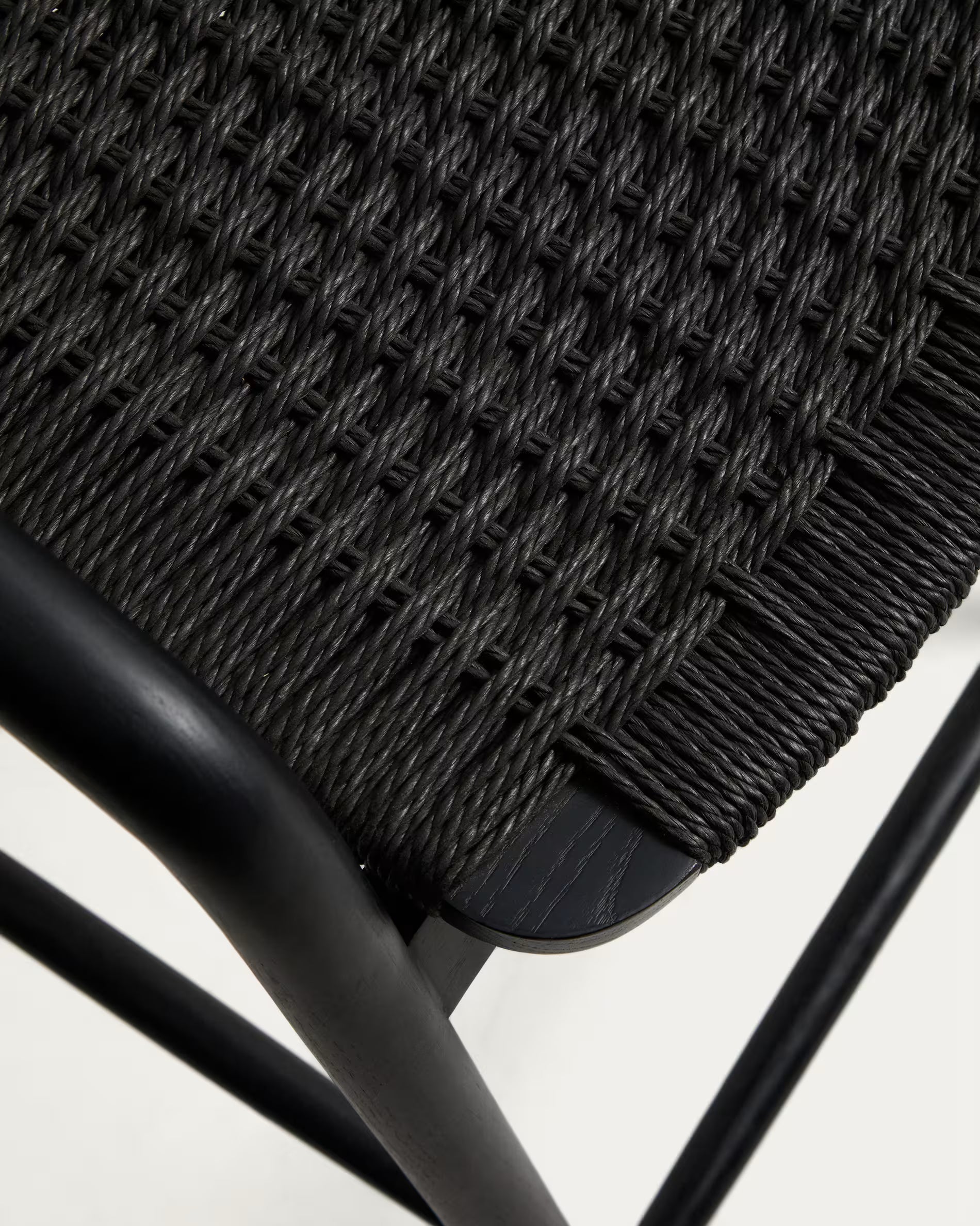 DERILE bar stool in black oak wood with a black cord.