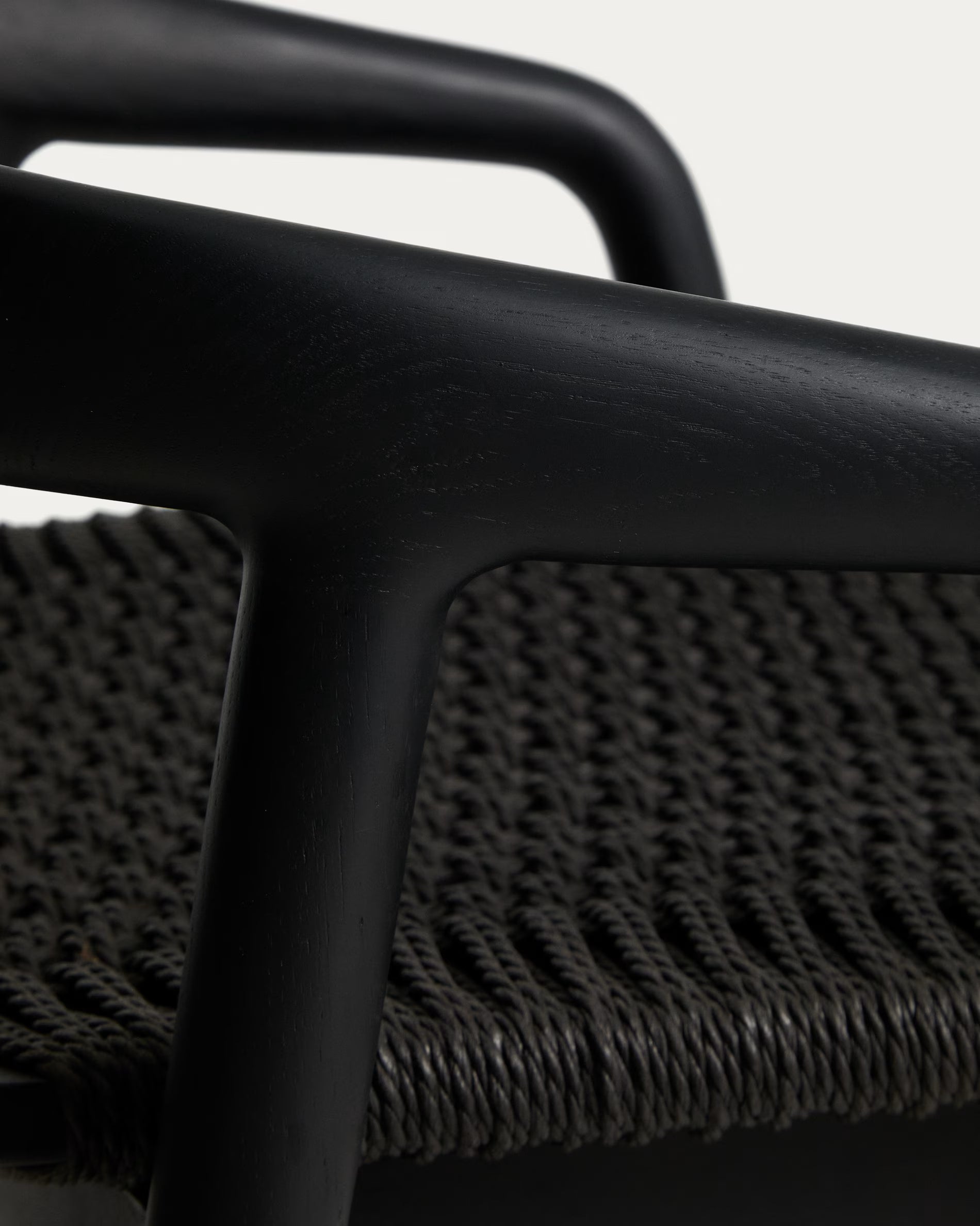 DERILE bar stool in black oak wood with a black cord.