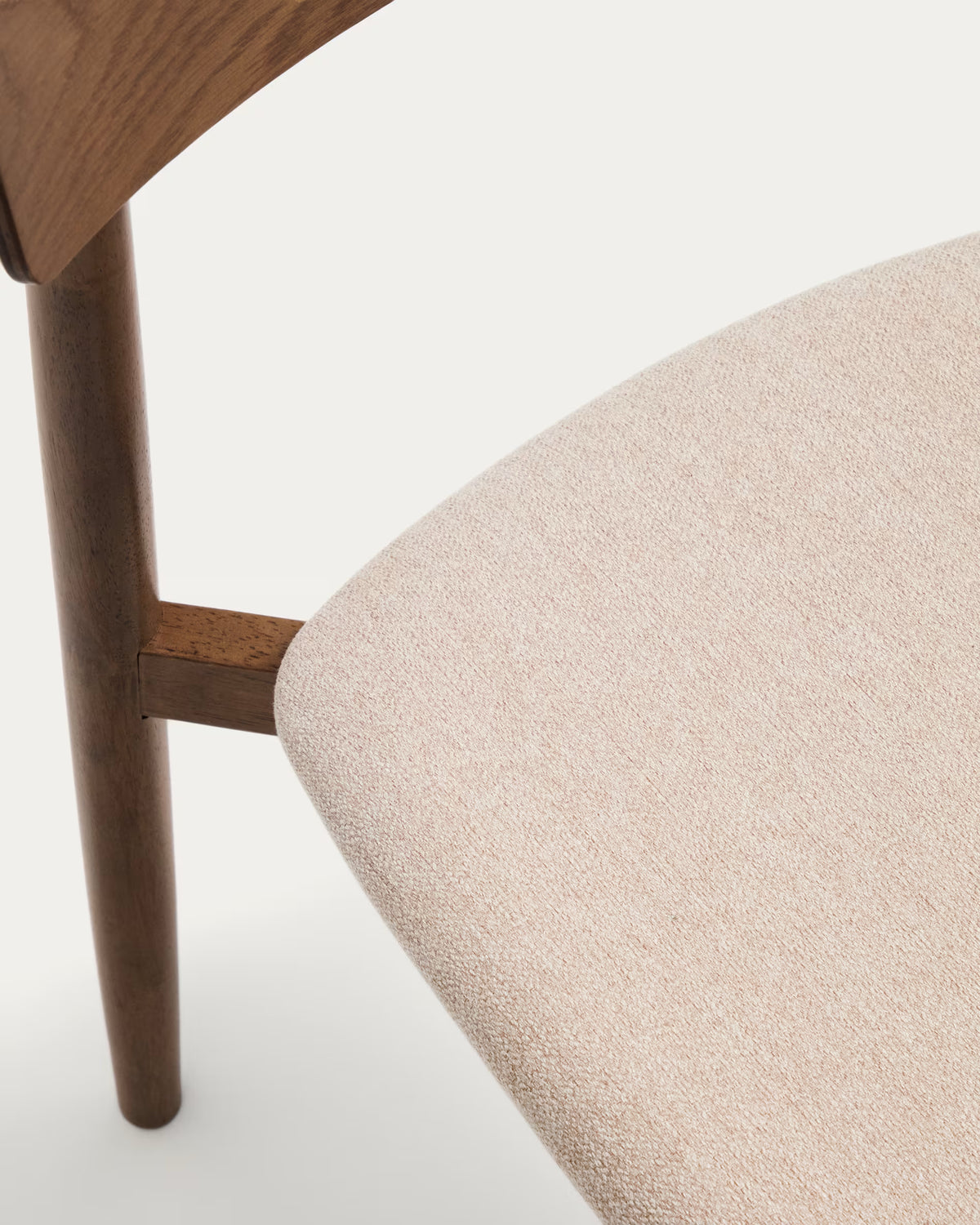 EVERA chair in beige chenille with a dark oak veneered base.