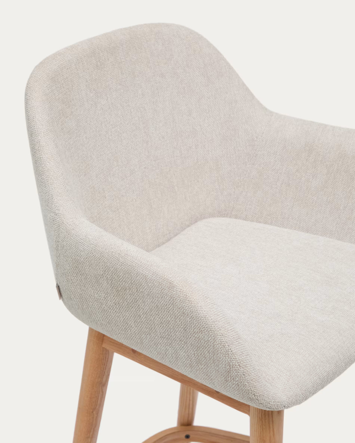 Beige riding chair with ash base