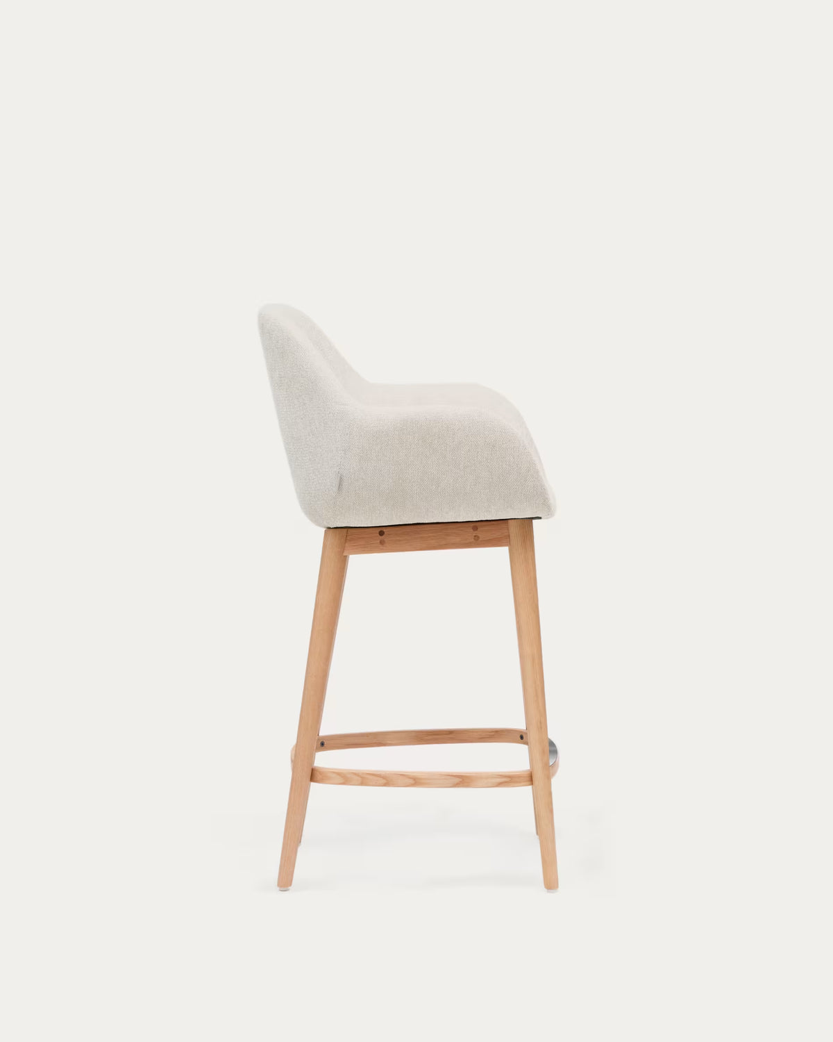 Beige riding chair with ash base