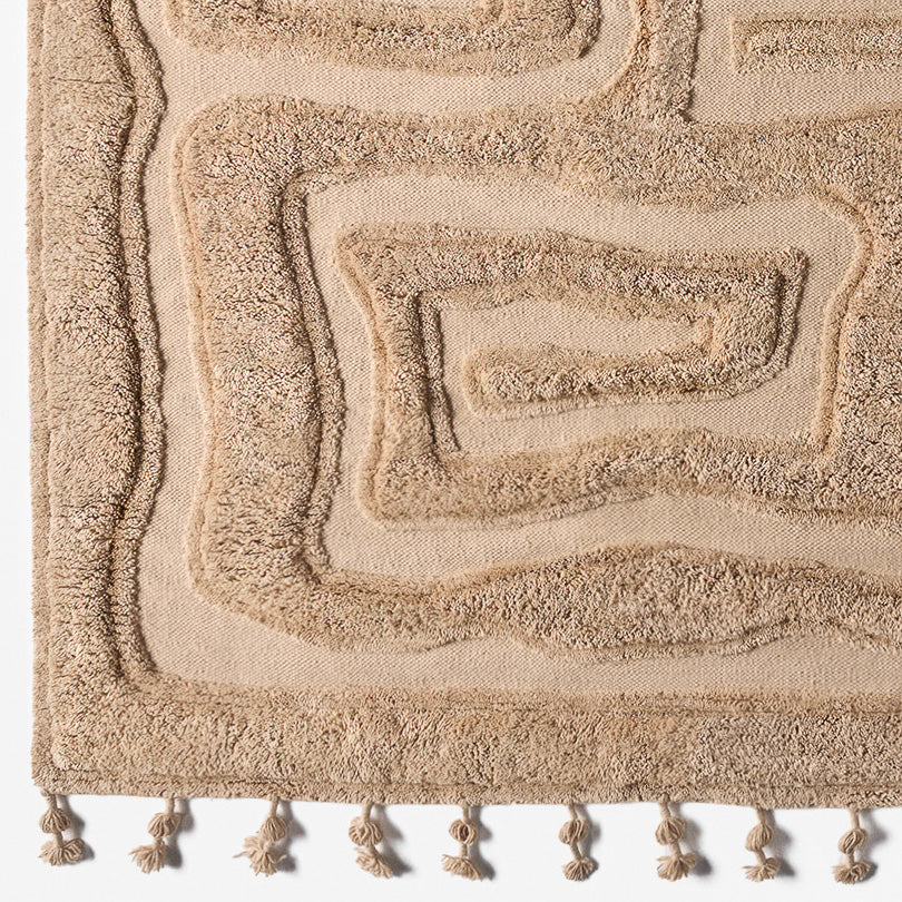 Wool rug BEATEN TRACK beige with fringes