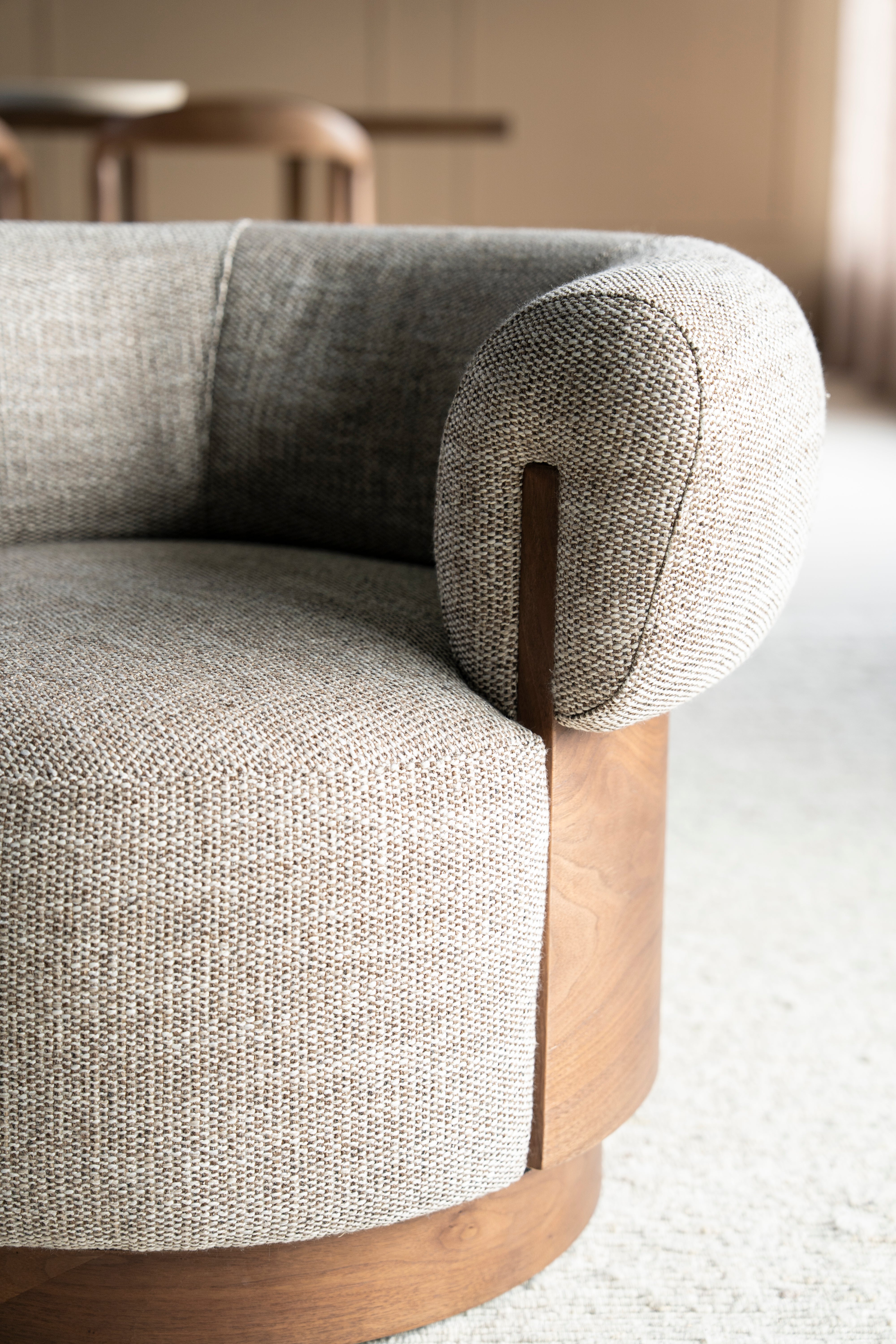 NILA taupe swivel armchair with a wooden frame