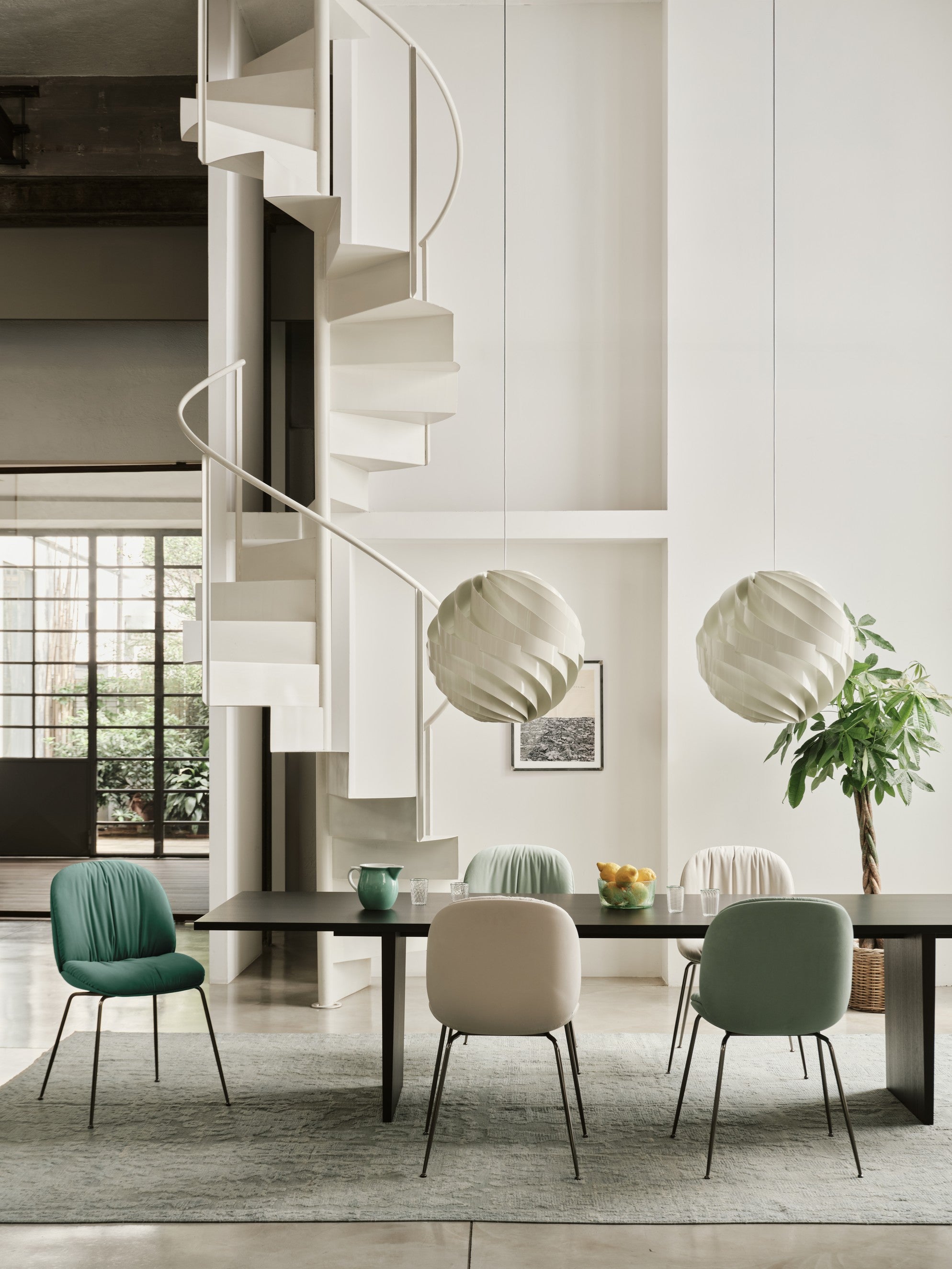 BEETLE SOFT upholstered chair with a black chrome base
