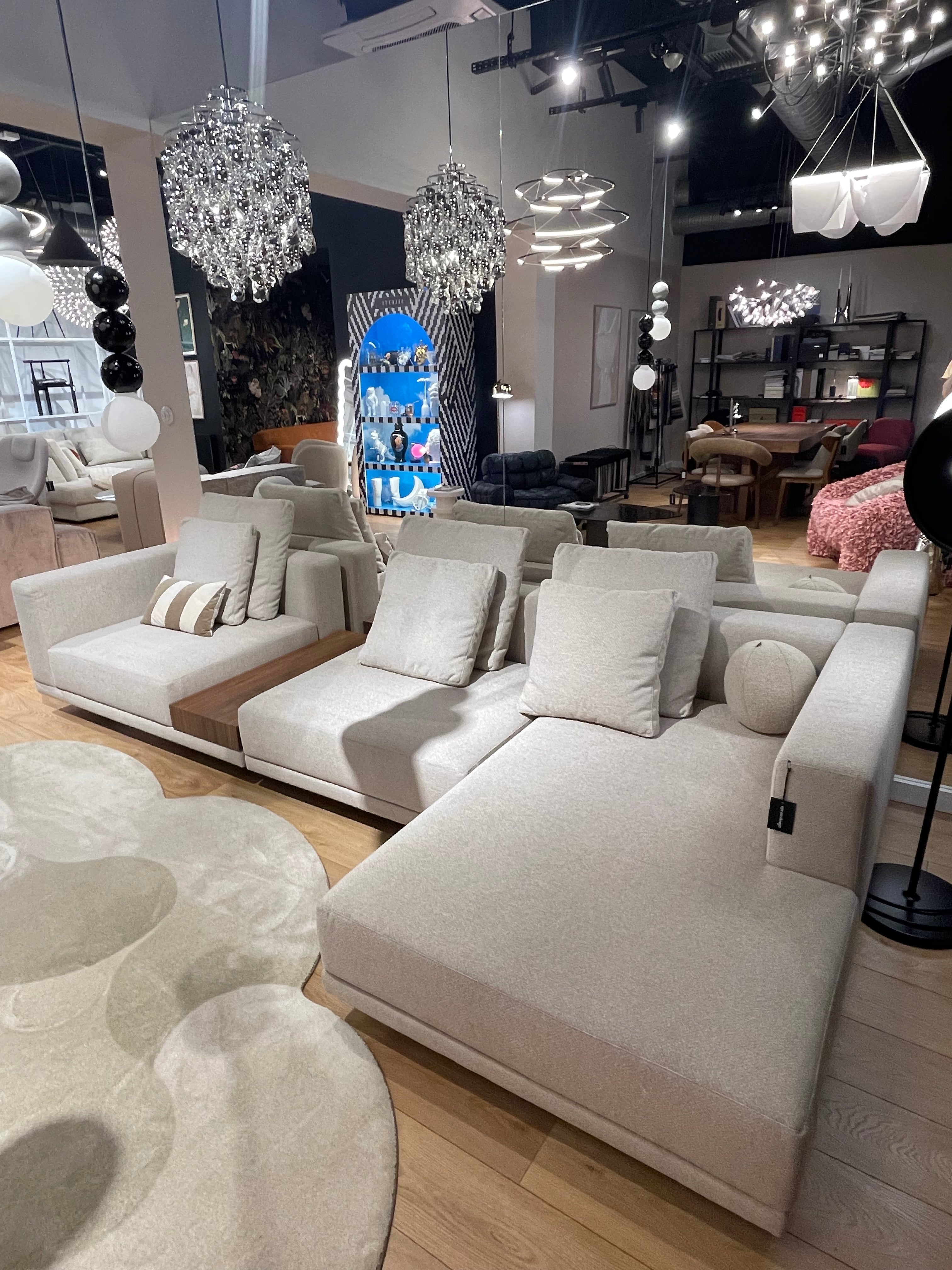 Classic beige modular sofa with right-side shelf - display model