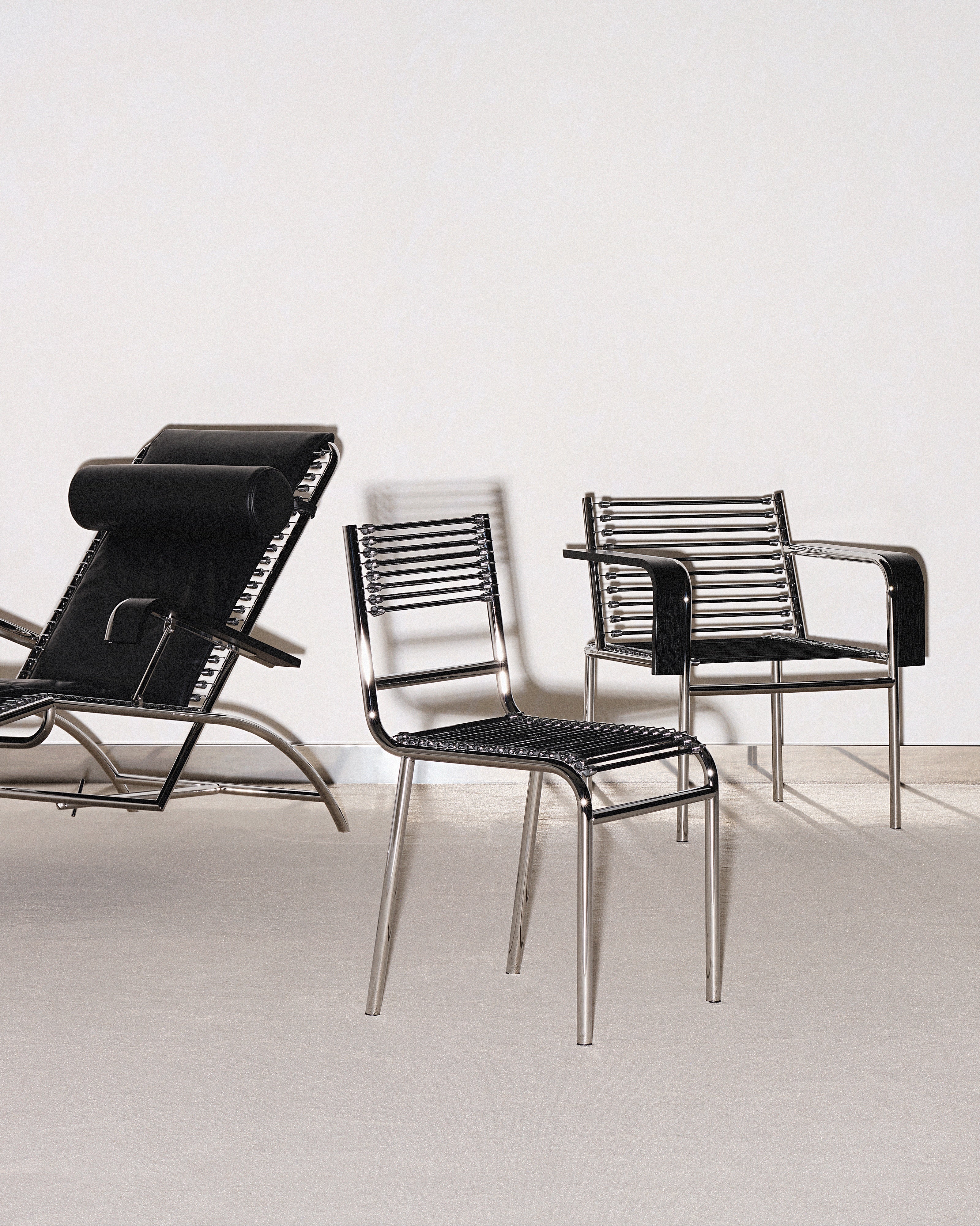 SANDOWS Armchair in Black with Steel Base