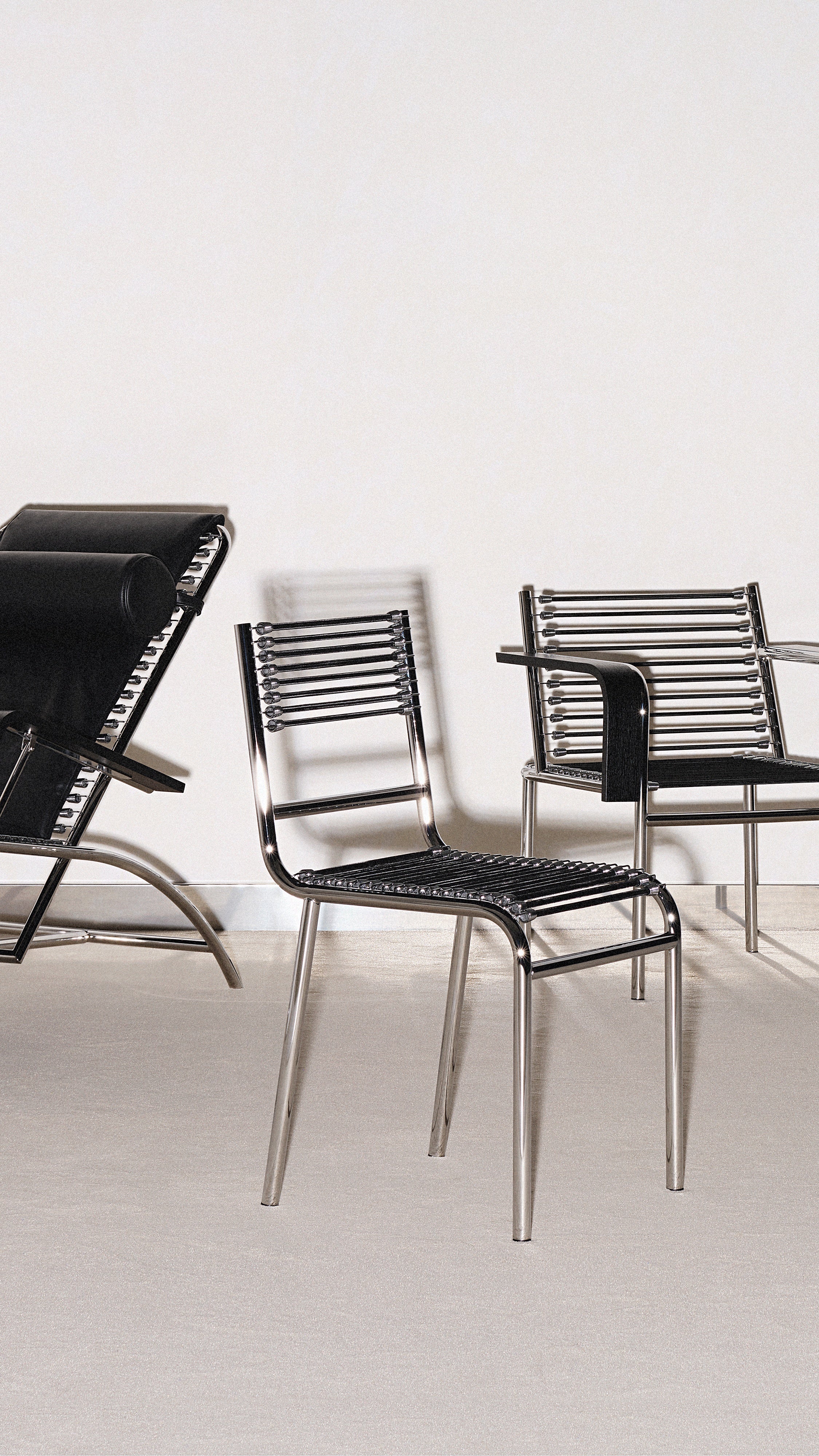 SANDOWS Armchair in Black with Steel Base
