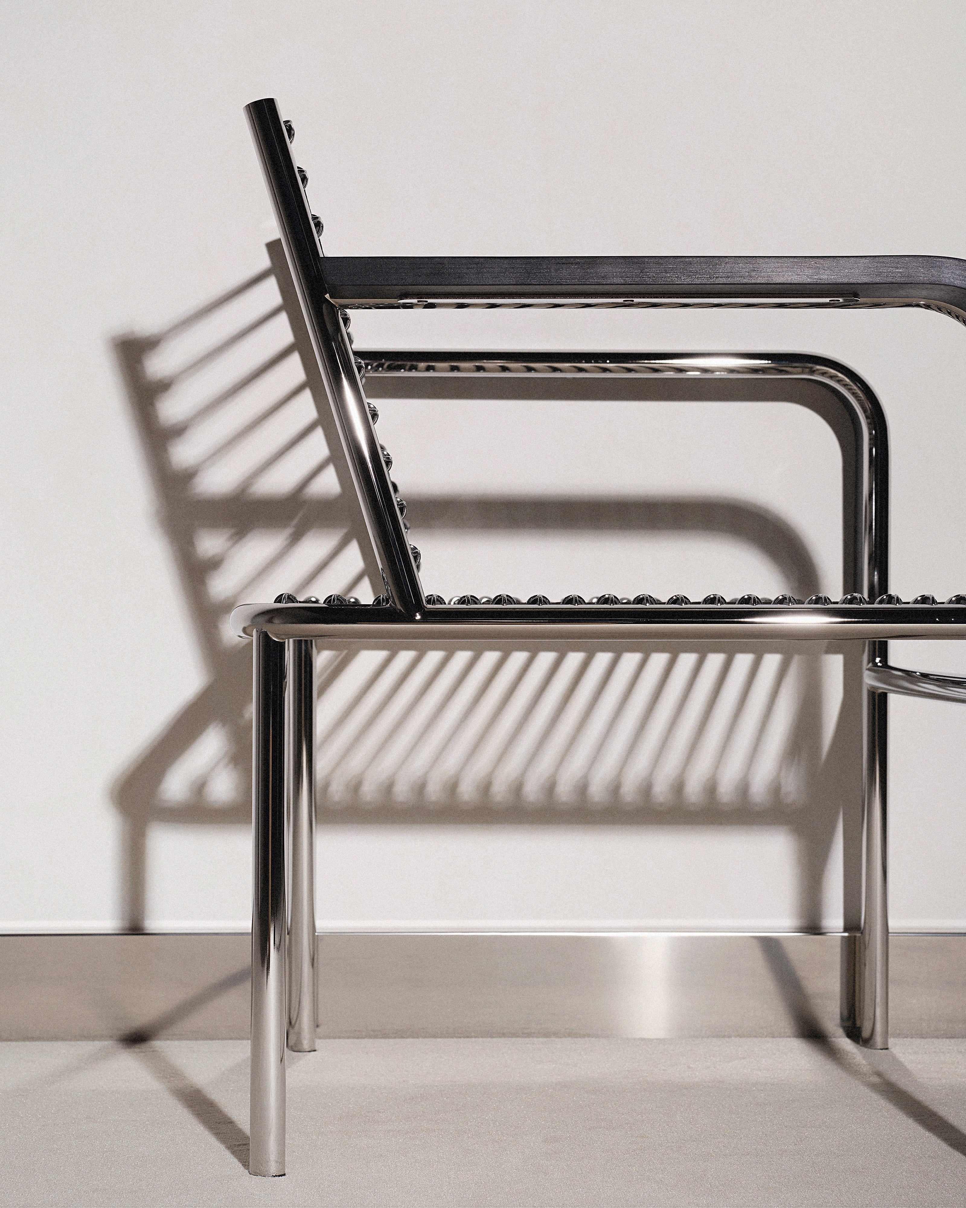 SANDOWS Armchair in Black with Steel Base