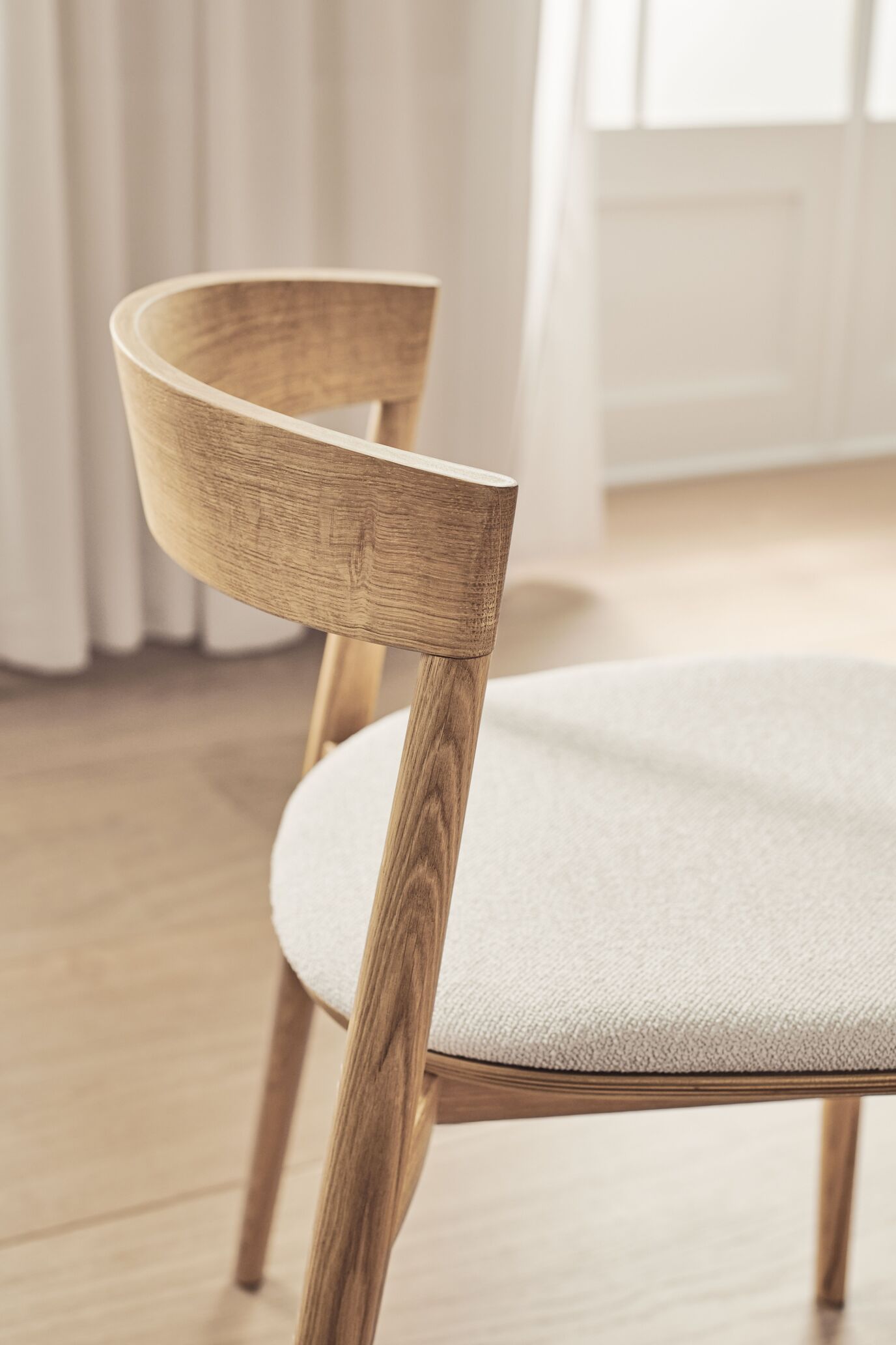 Kite upholstered chair with a gray base