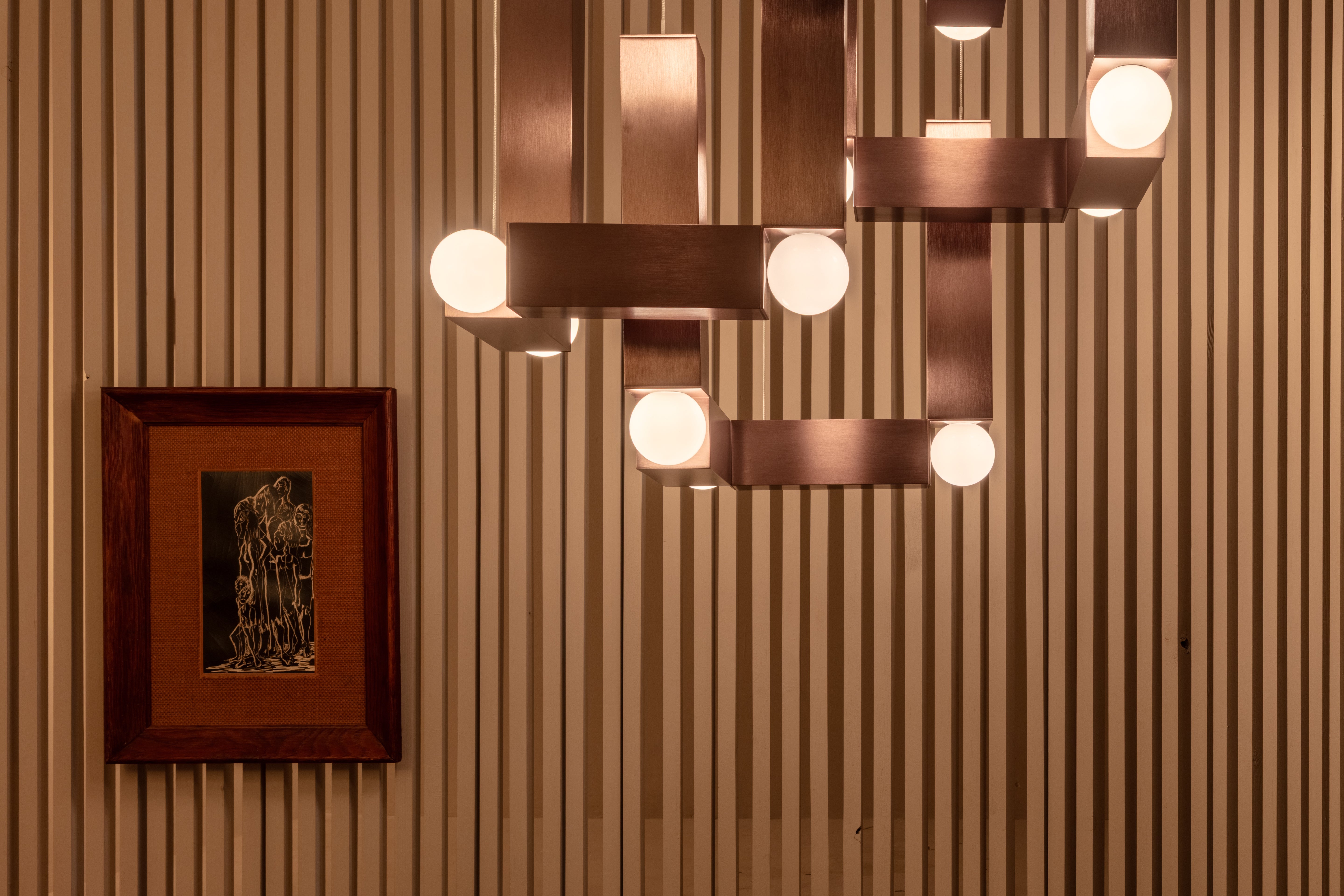 VESPER DUO pendant lamp with an opal shade and brown finish.