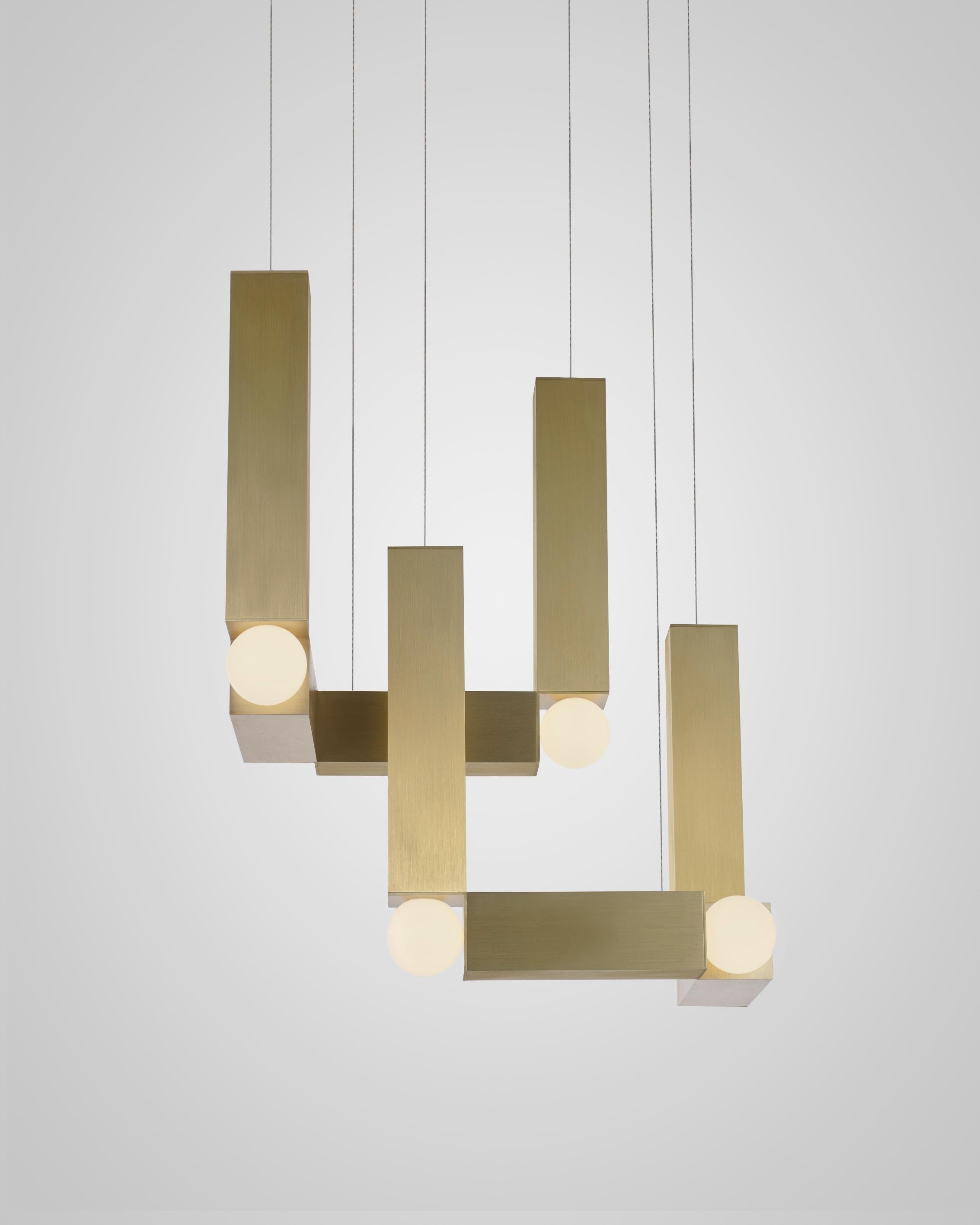 VESPER DUO pendant lamp with an opal shade and gold finish.
